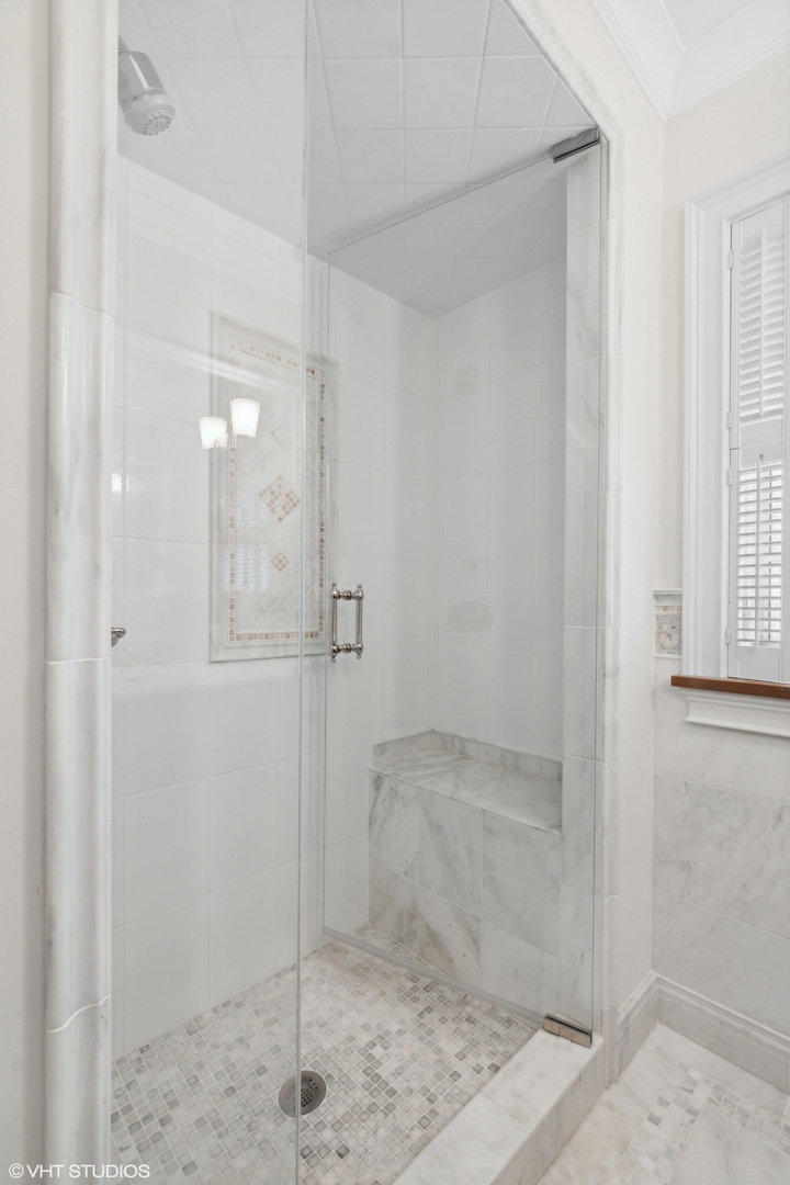 1224 Ridgewood Drive Northbrook, IL 60062 - Photo 24 of 34 a bathroom with a shower