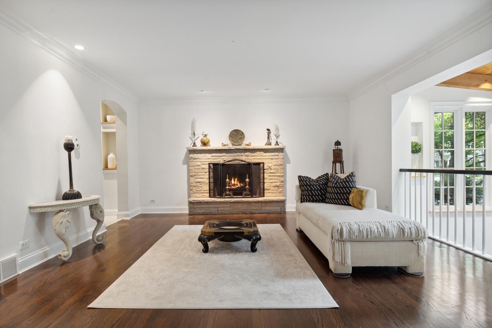 1224 Ridgewood Drive Northbrook, IL 60062 - Photo 5 of 34 a living room with furniture and a fireplace