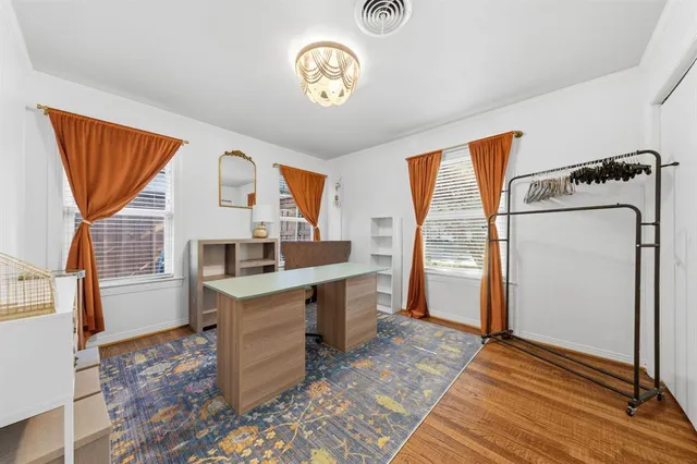 a view of kitchen with sink window and refrigerator