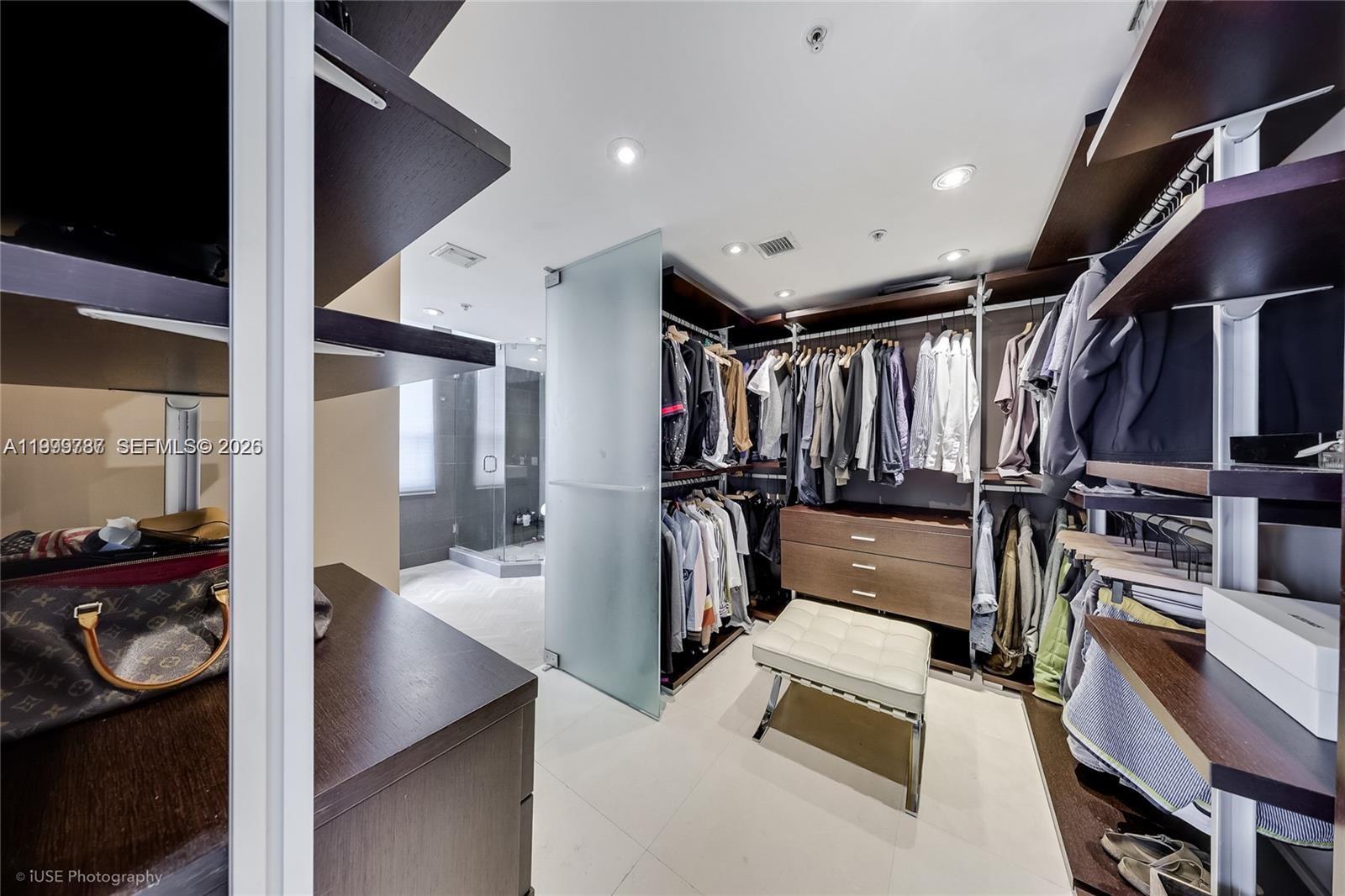 701 Brickell Key Boulevard, Unit 503 Miami, FL 33131 - Photo 12 of 25 a view of a room with lots of gym equipment