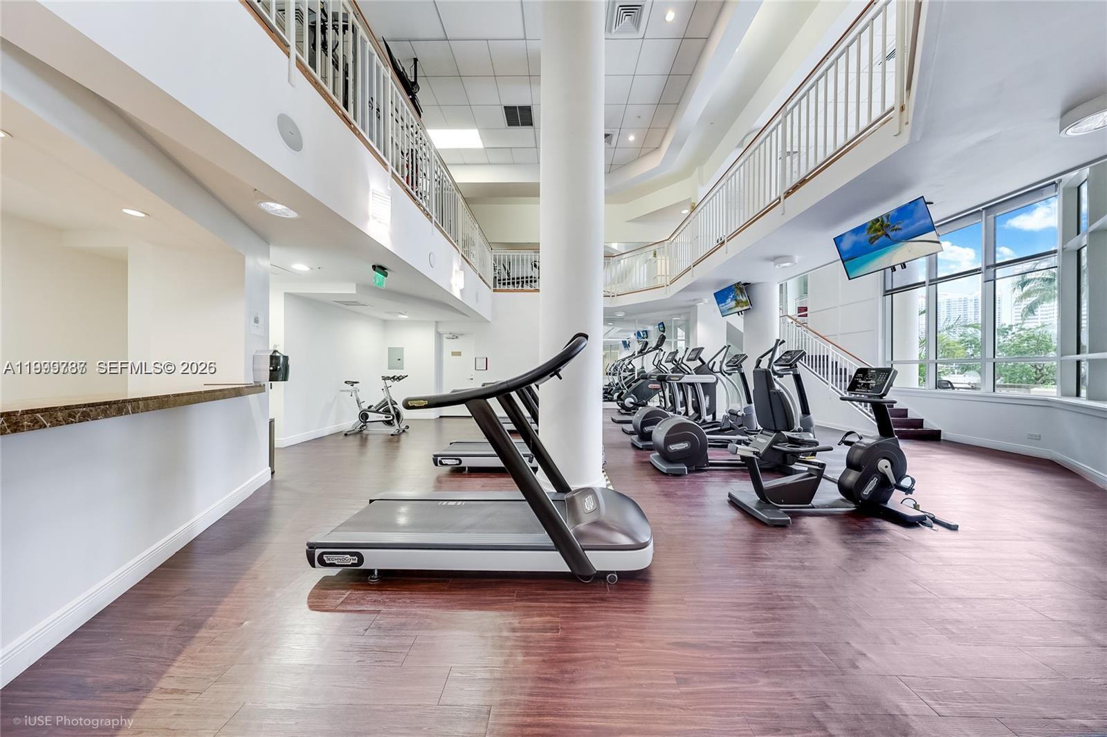 701 Brickell Key Boulevard, Unit 503 Miami, FL 33131 - Photo 18 of 25 a view of a room with gym equipment