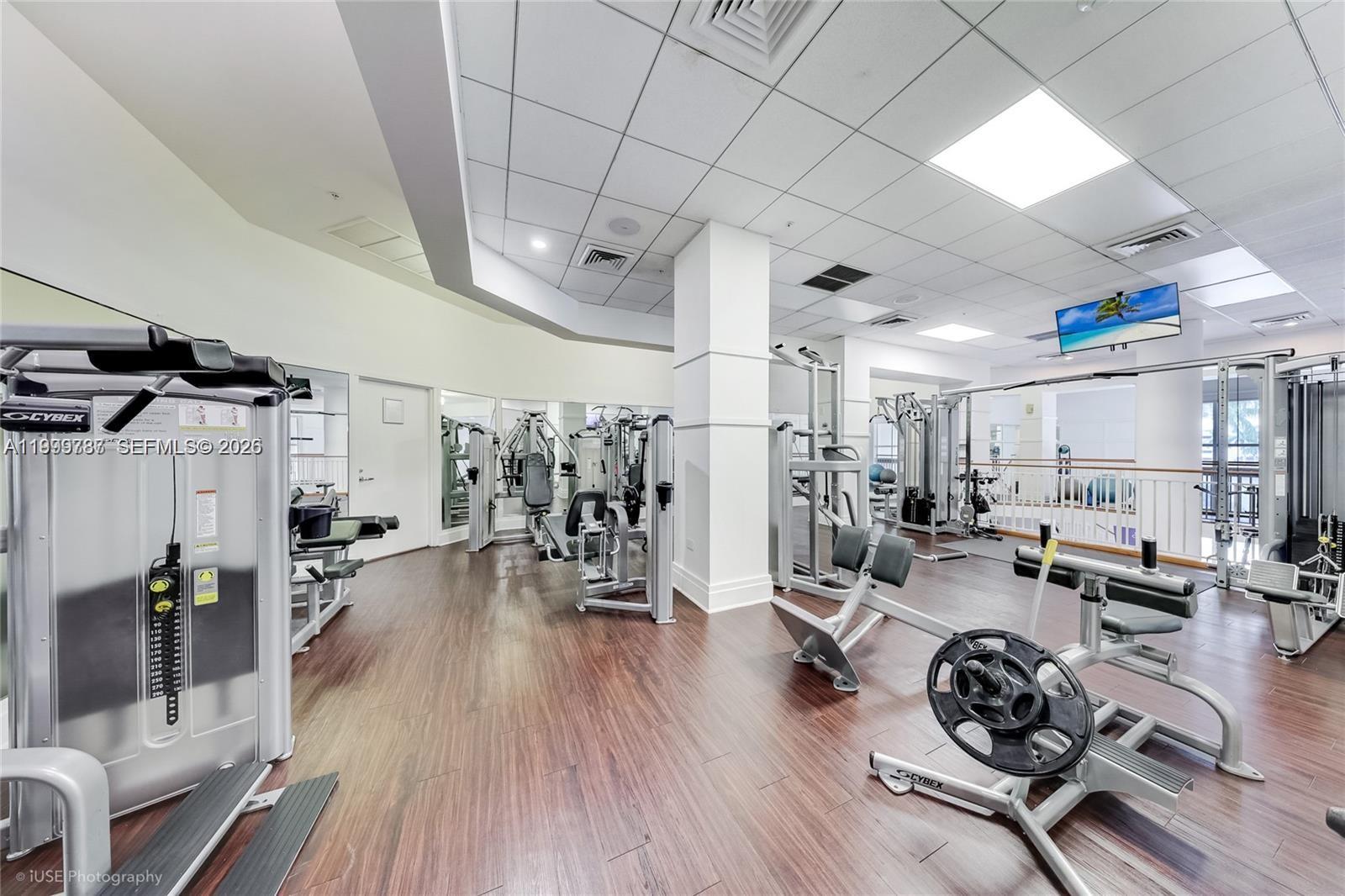 701 Brickell Key Boulevard, Unit 503 Miami, FL 33131 - Photo 19 of 25 a view of a room with gym equipment