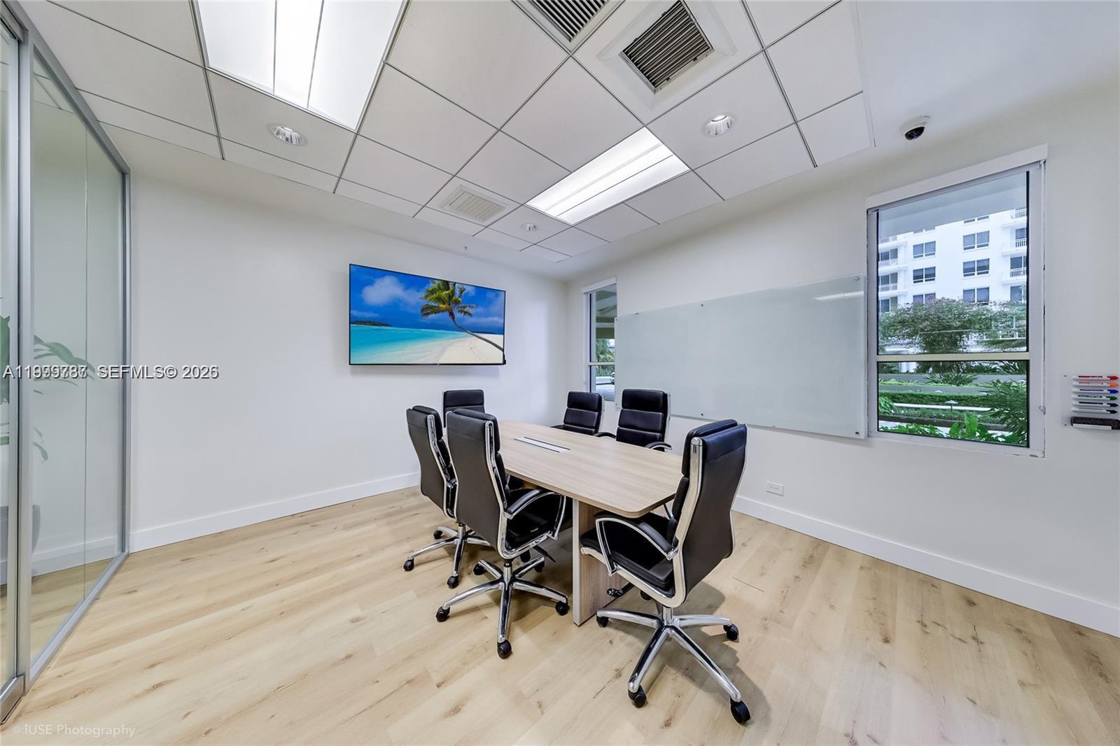 701 Brickell Key Boulevard, Unit 503 Miami, FL 33131 - Photo 22 of 25 a view of a dining room with furniture and a window