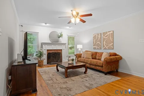 a kitchen with stainless steel appliances granite countertop a refrigerator a stove a sink and a refrigerator