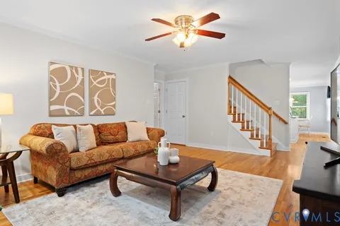 a kitchen with stainless steel appliances granite countertop a sink and a stove