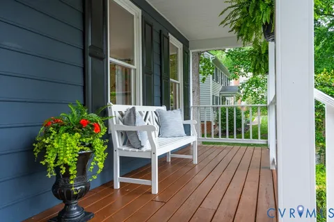 a view of balcony with furniture