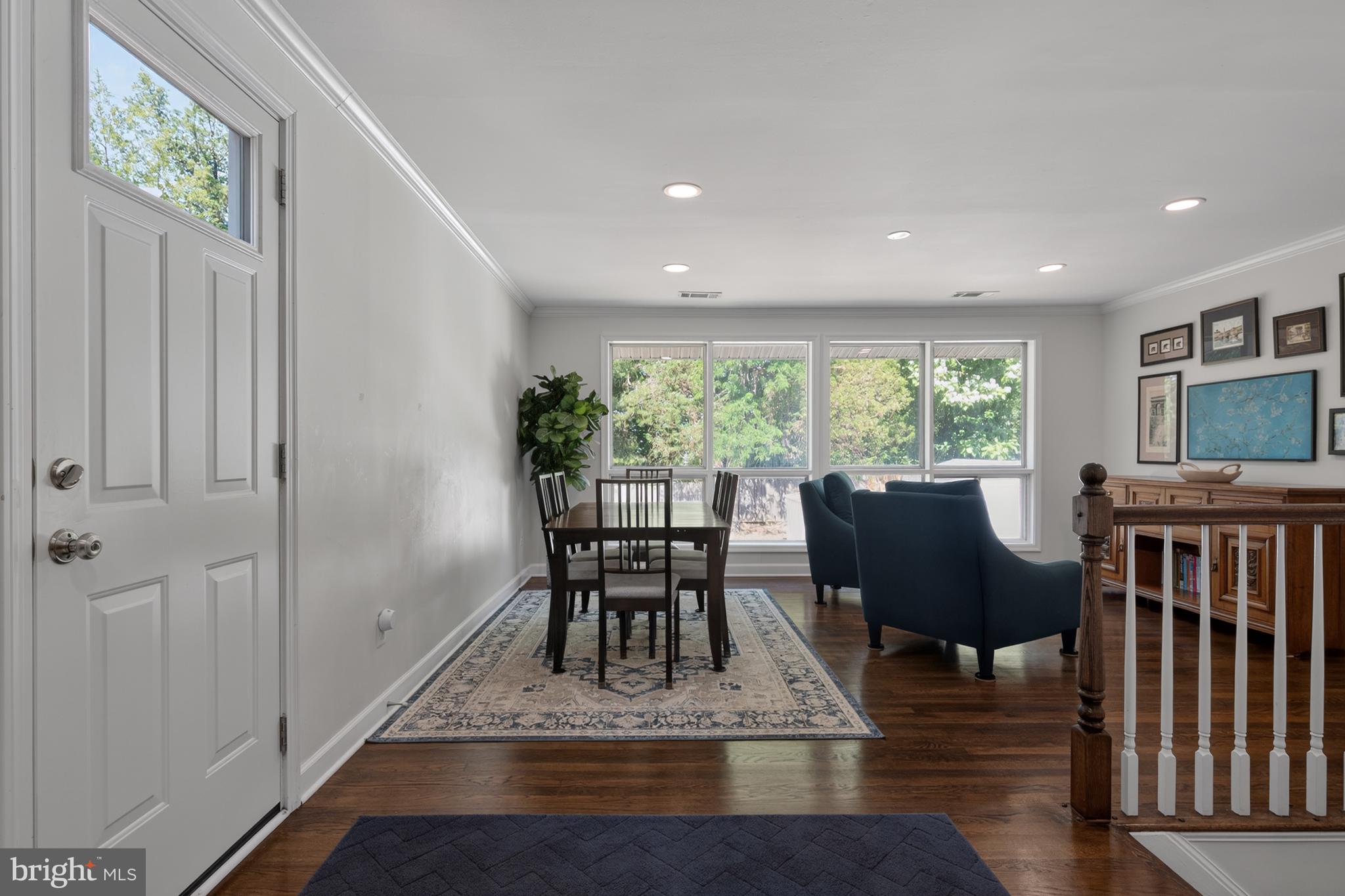 Dining and living areas flow from the kitchen