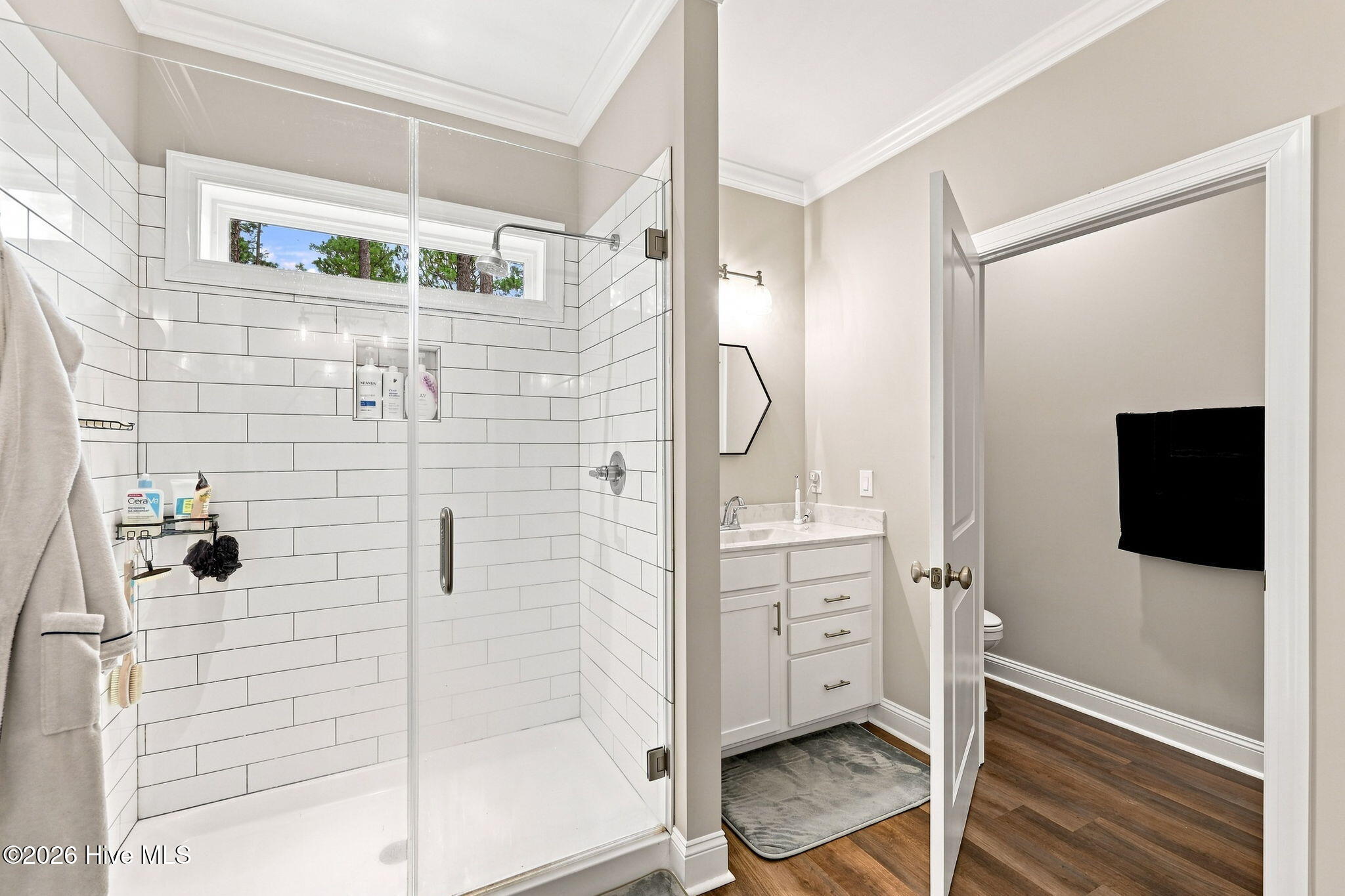 560 North Ridgecrest Street Aberdeen, NC 28315 - Photo 5 of 48 primary bath with walk in tiled shower and 2 separate vanities