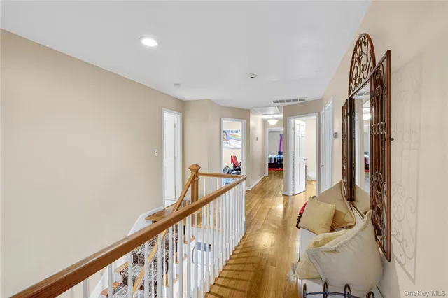 an aerial view of a residential houses with outdoor space