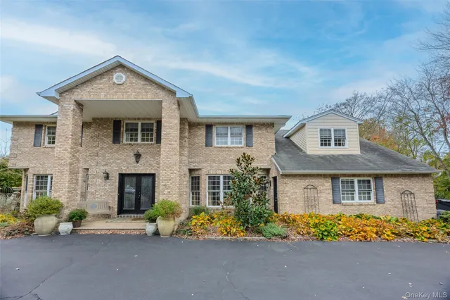 a view of a swimming pool with a yard
