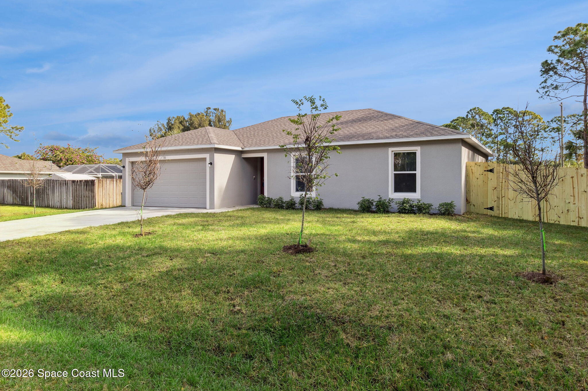 700 Tejon Avenue Southwest Palm Bay, FL 32908 - Photo 2 of 33 a view of a house with a yard
