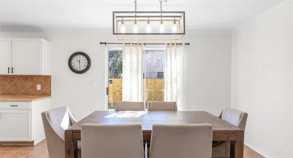 a room with a table and a clock