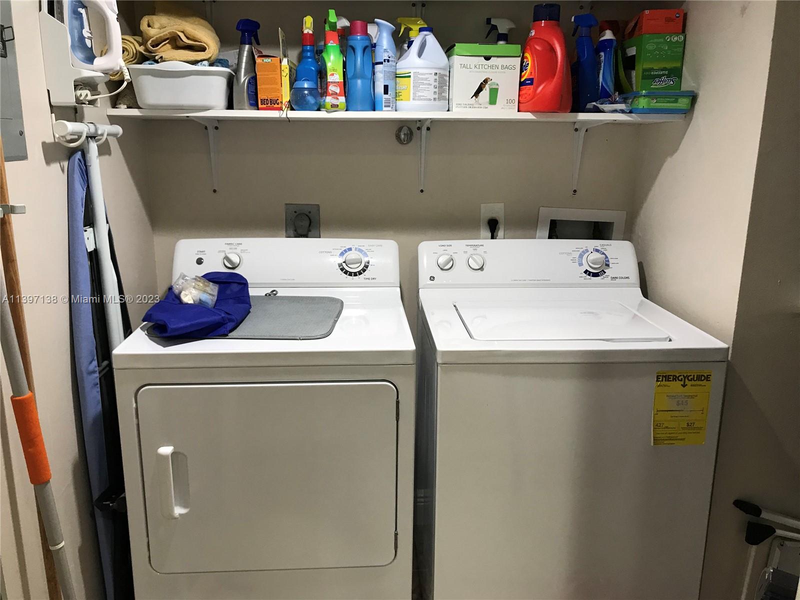 Bonaventure Weston, FL 33326 - Photo 9 of 14 a utility room with dryer and washer