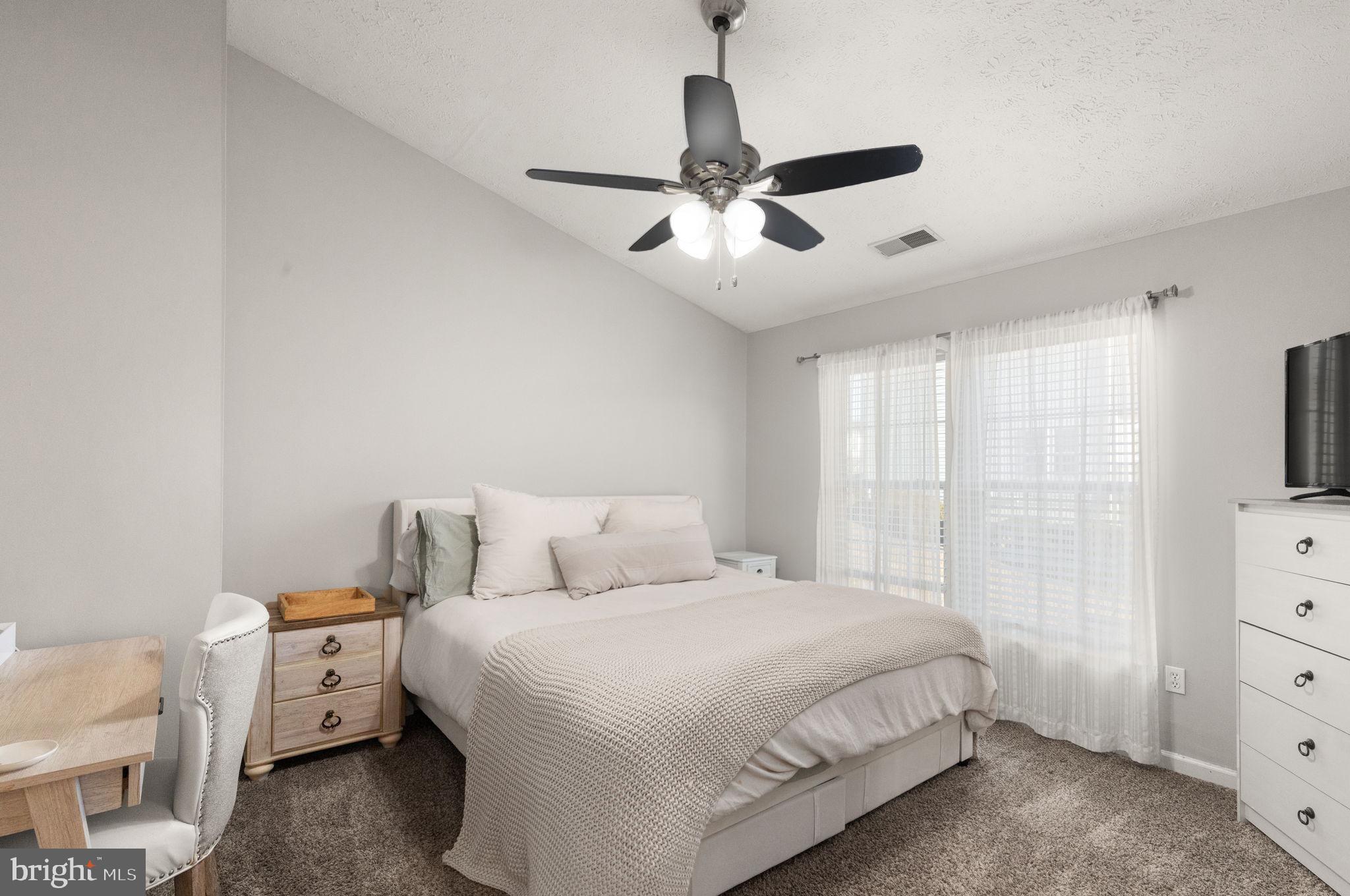 488 Crestridge Way Abingdon, MD 21009 - Photo 11 of 22 a bedroom with a bed and a window