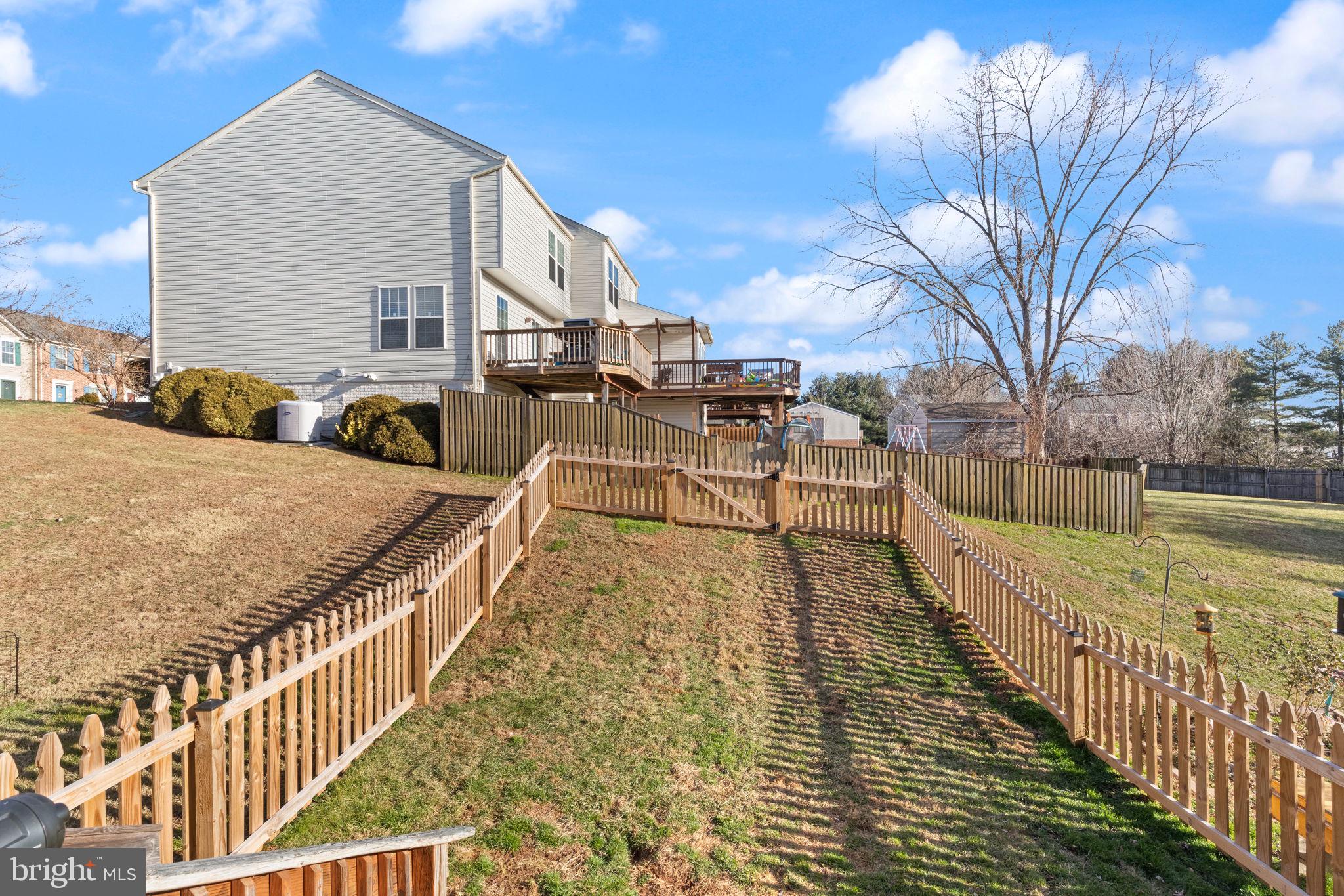 488 Crestridge Way Abingdon, MD 21009 - Photo 20 of 22 a view of a house with wooden deck