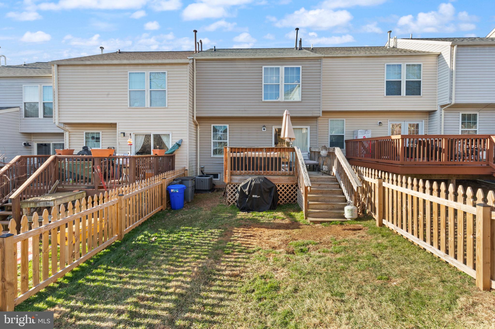 488 Crestridge Way Abingdon, MD 21009 - Photo 21 of 22 a view of a house with deck and furniture