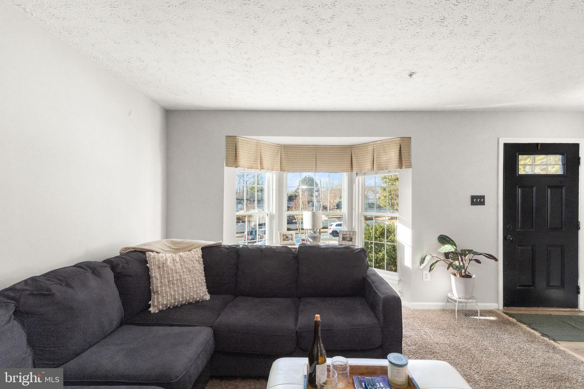 488 Crestridge Way Abingdon, MD 21009 - Photo 6 of 22 a living room with furniture and a large window