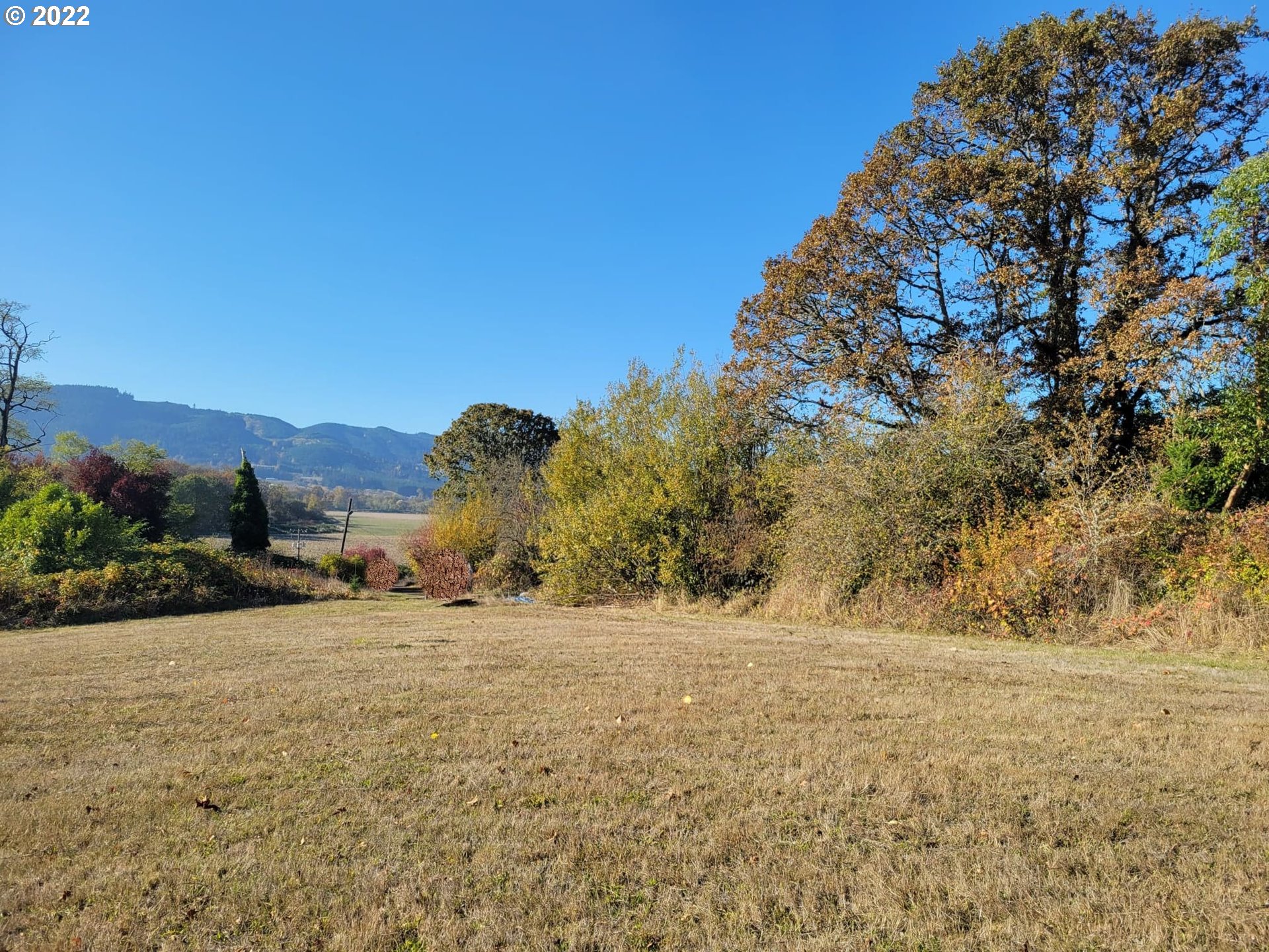 43965 Southwest Ritchey Road Forest Grove, OR 97116 - Photo 3 of 5 a view of an outdoor space with a lake view