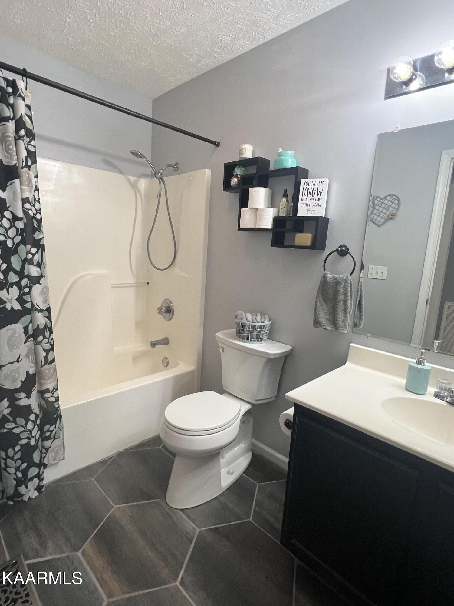 114 Bishop Street Alcoa, TN 37701 - Photo 14 of 20 a bathroom with a sink toilet and shower