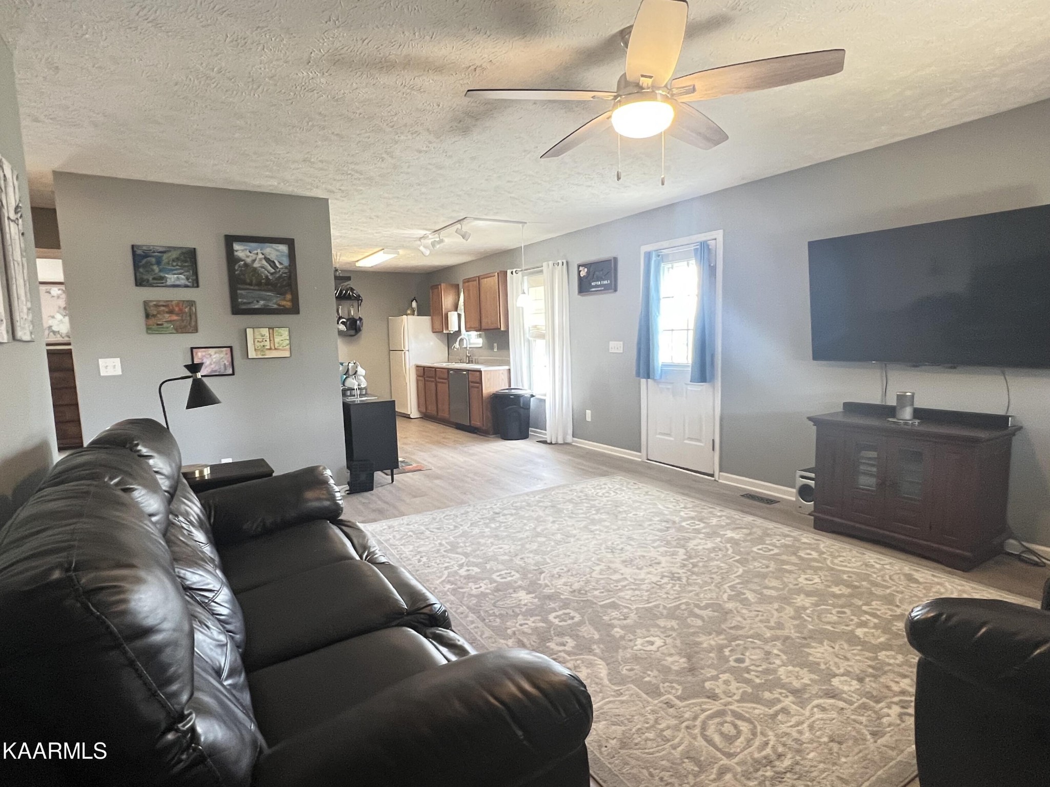114 Bishop Street Alcoa, TN 37701 - Photo 7 of 20 a living room with furniture and a flat screen tv