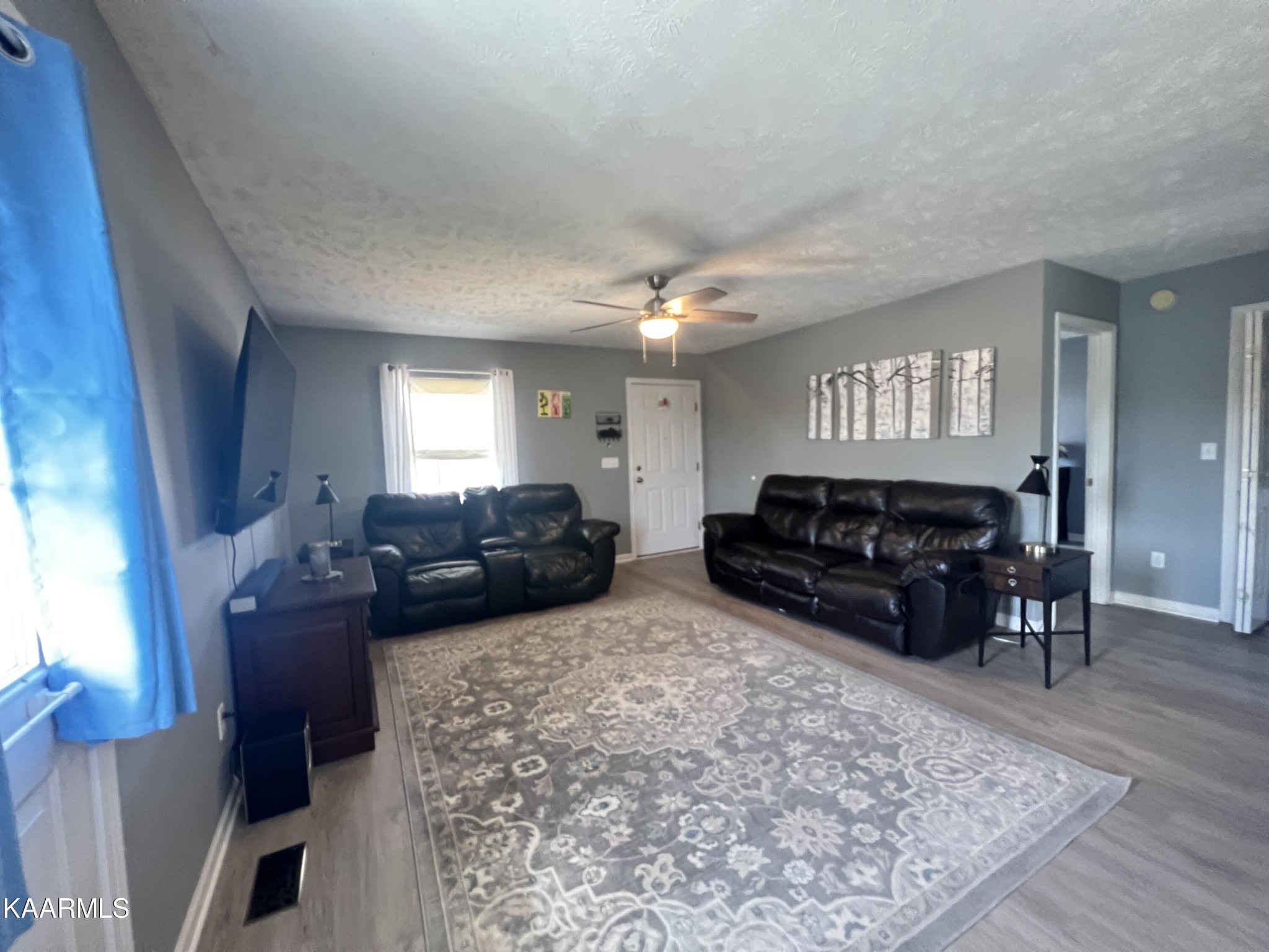 114 Bishop Street Alcoa, TN 37701 - Photo 8 of 20 a living room with furniture and wooden floor