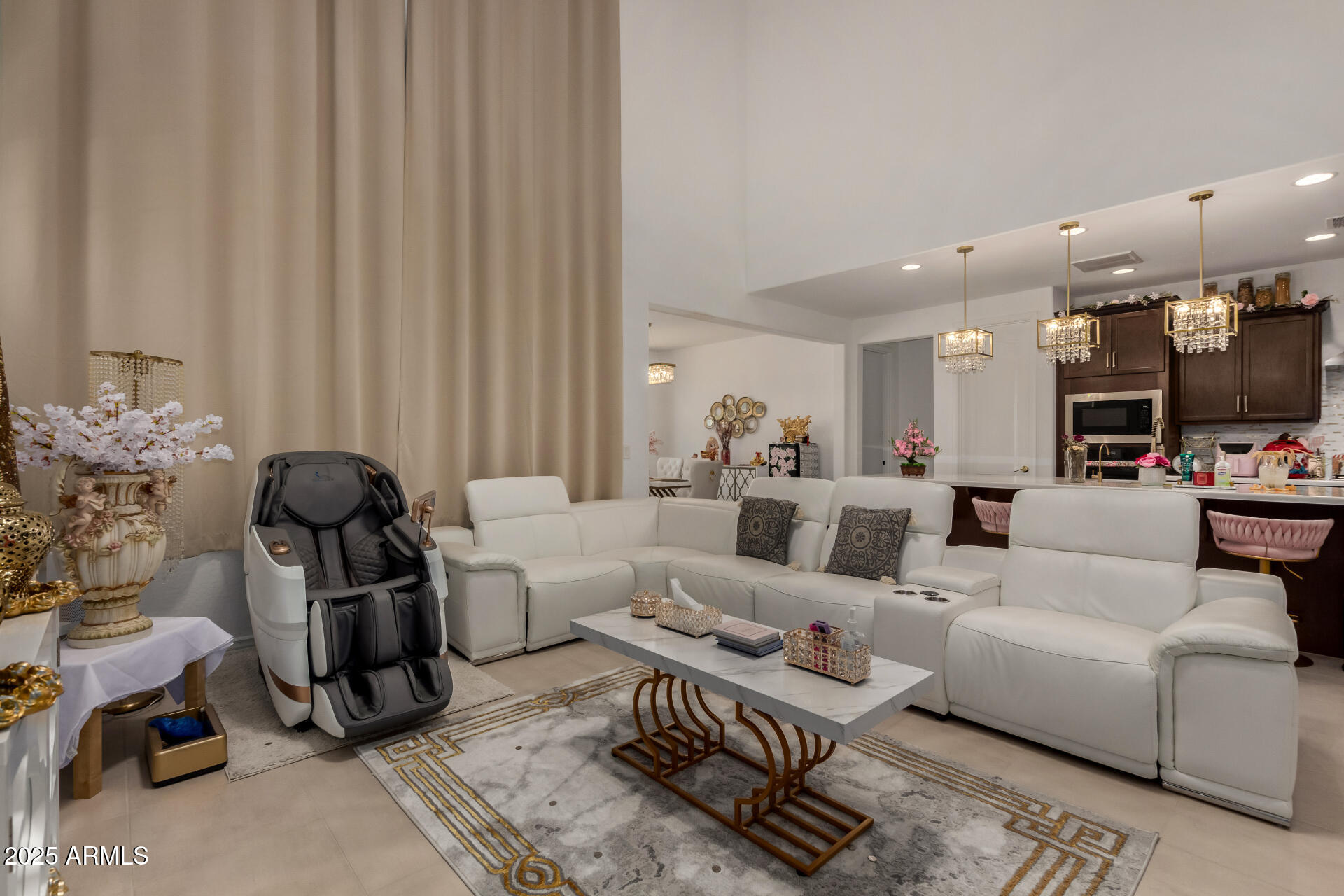 12120 West Pkwy Lane Avondale, AZ 85323 - Photo 12 of 45 a living room with furniture and a flat screen tv