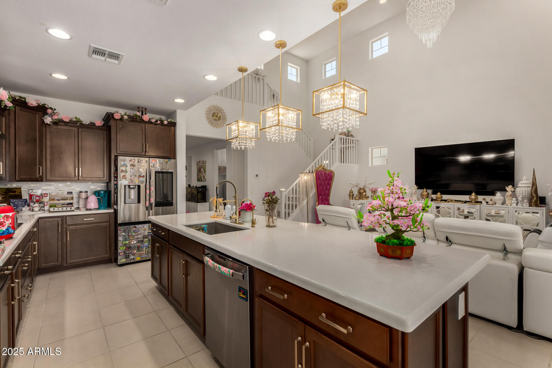12120 West Pkwy Lane Avondale, AZ 85323 - Photo 17 of 45 a kitchen with stainless steel appliances a stove sink and cabinets
