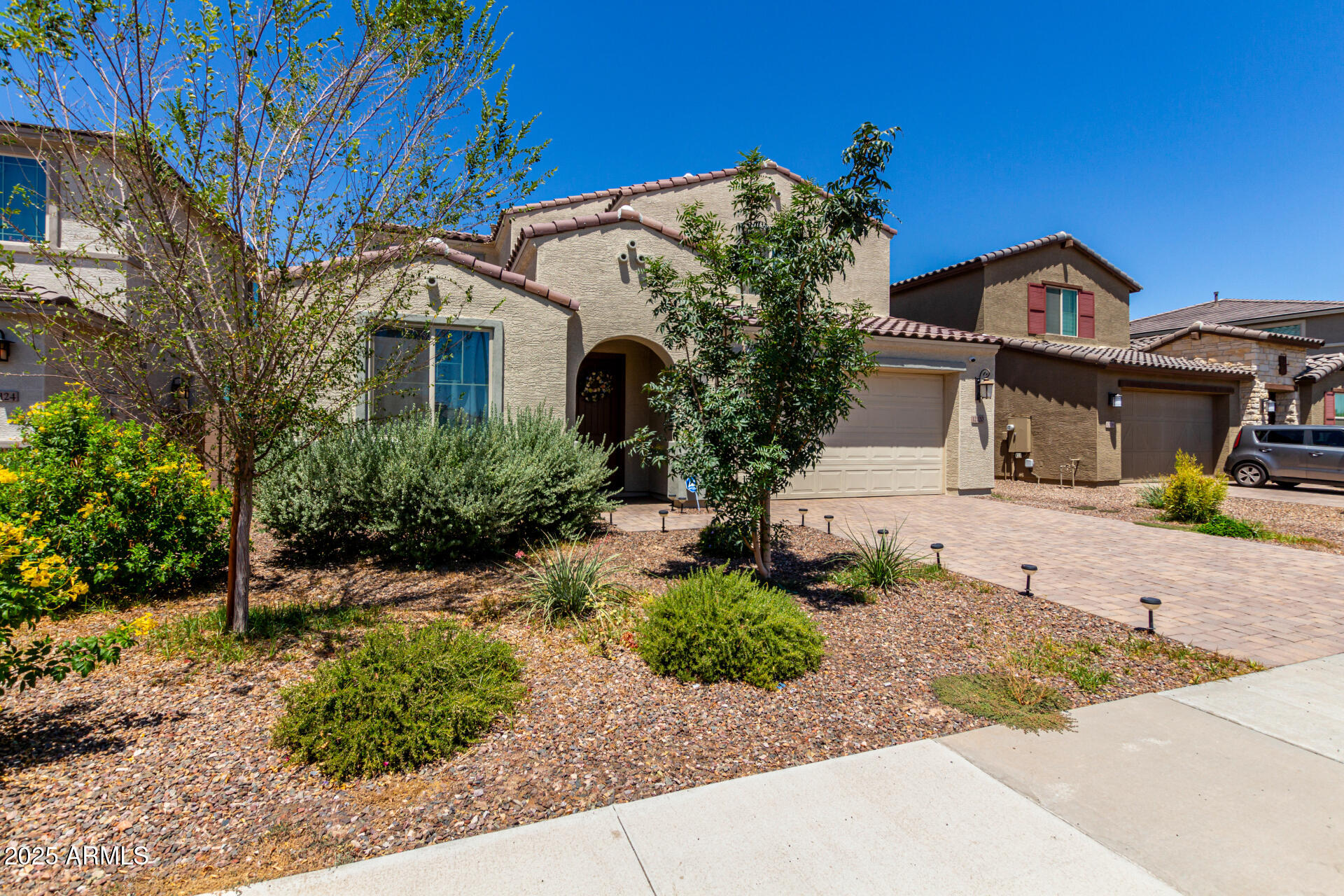 12120 West Pkwy Lane Avondale, AZ 85323 - Photo 3 of 45 a front view of a house with a yard