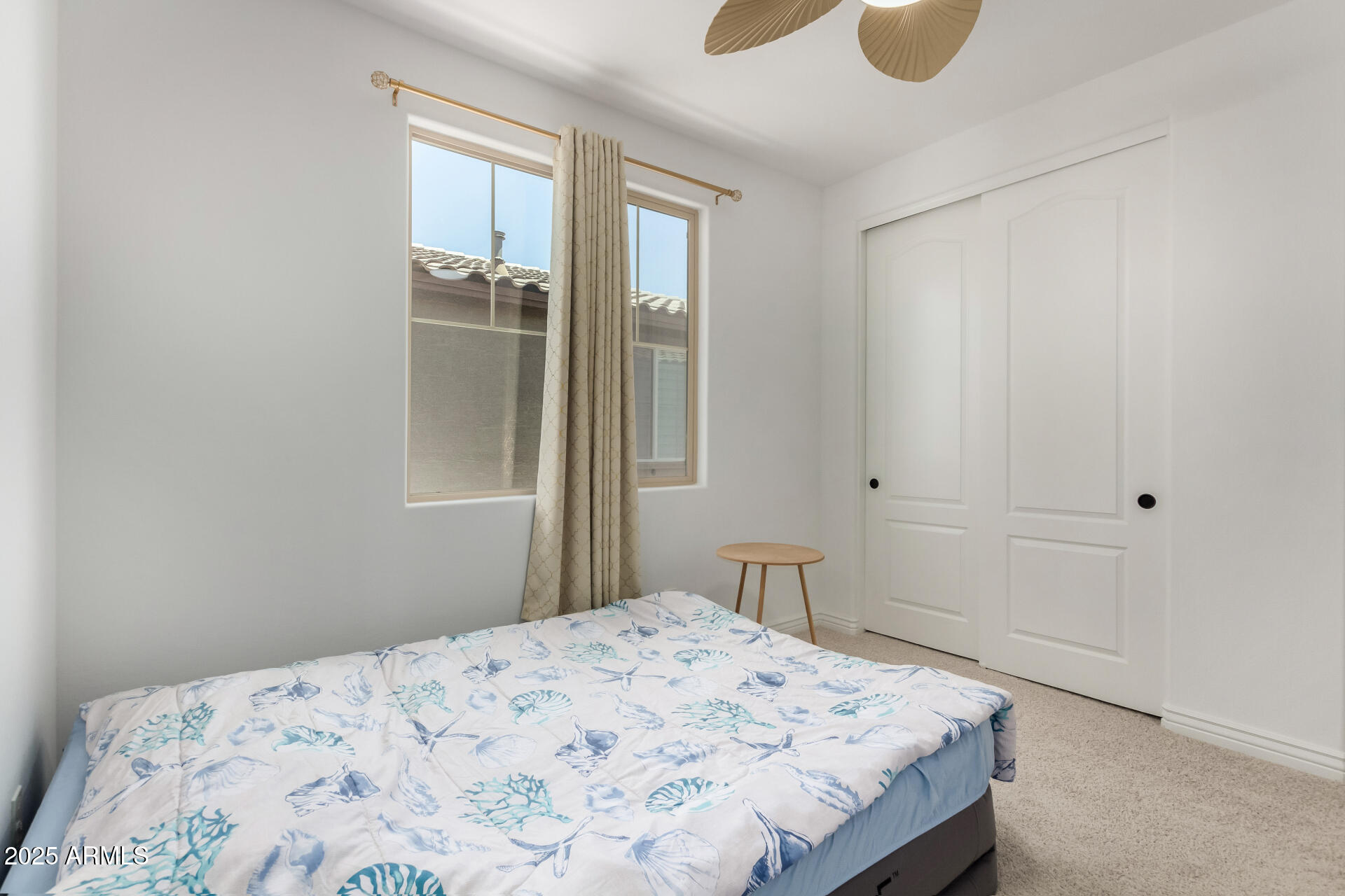 12120 West Pkwy Lane Avondale, AZ 85323 - Photo 32 of 45 a bedroom with a bed and a window