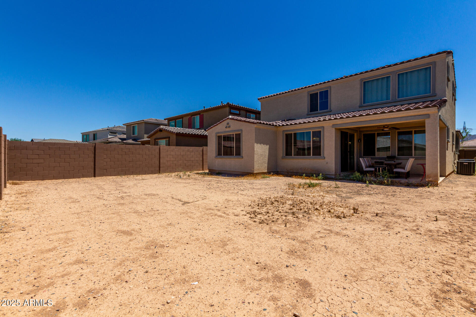 12120 West Pkwy Lane Avondale, AZ 85323 - Photo 44 of 45 a front view of a house with a yard