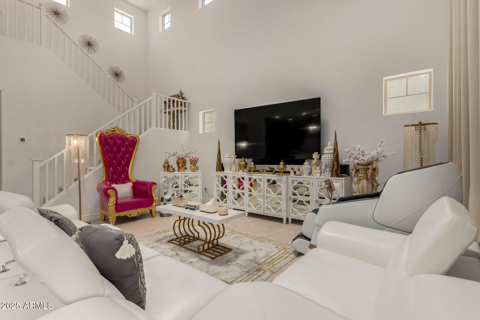 12120 West Pkwy Lane Avondale, AZ 85323 - Photo 10 of 45 a living room with furniture and a flat screen tv