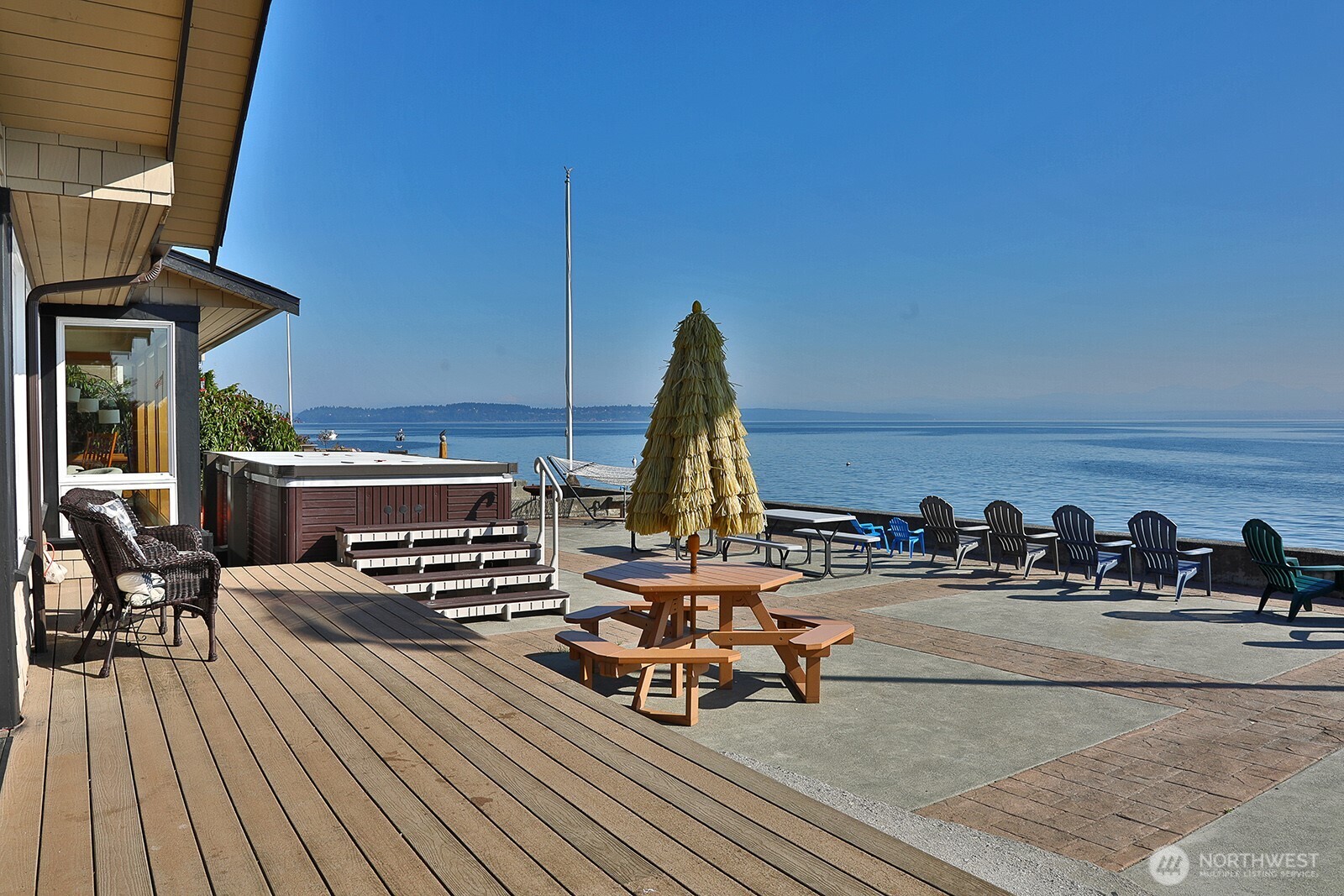4913 Marshall Road Clinton, WA 98236 - Photo 16 of 40 a view of a terrace with seating area