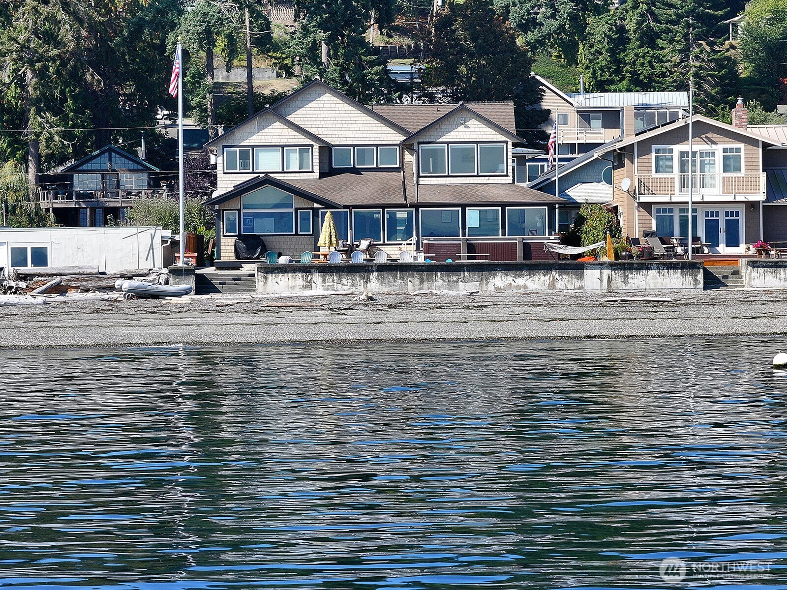 4913 Marshall Road Clinton, WA 98236 - Photo 2 of 40 a front view of a house with a boat