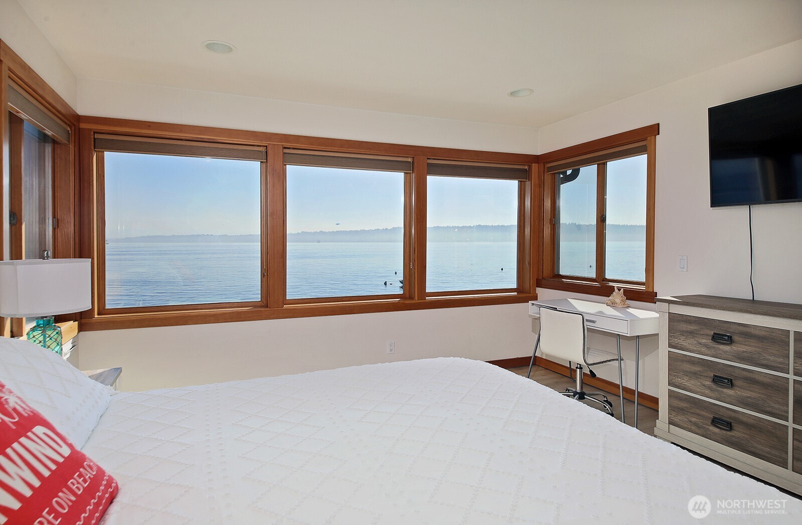 4913 Marshall Road Clinton, WA 98236 - Photo 23 of 40 a room with a bed and a large window