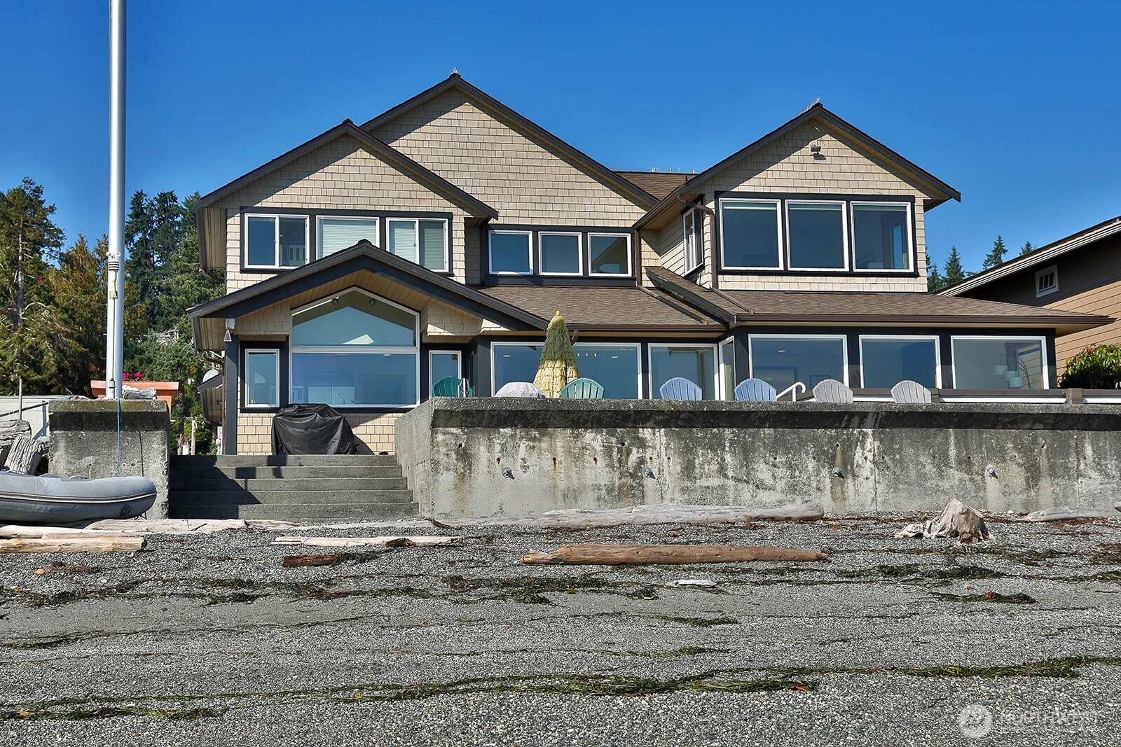 4913 Marshall Road Clinton, WA 98236 - Photo 3 of 40 a front view of a house with a yard