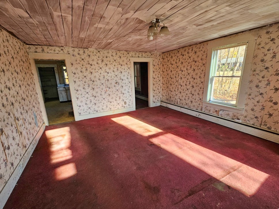 2428 Main Street Athol, MA 01331 - Photo 11 of 14 a view of empty room with windows