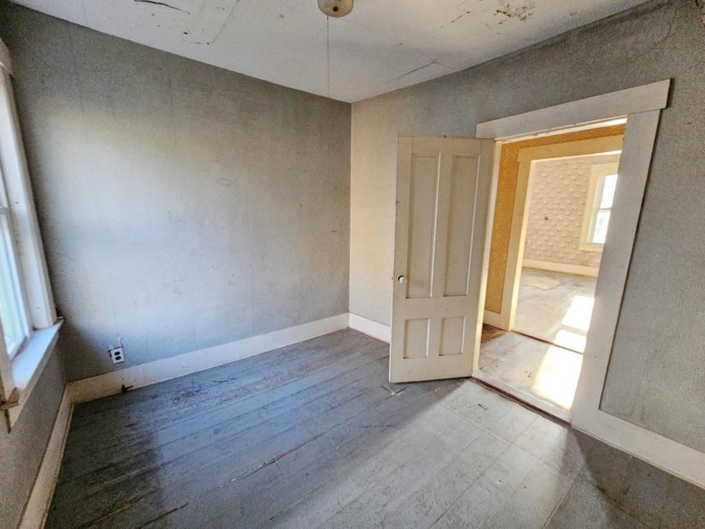 2428 Main Street Athol, MA 01331 - Photo 14 of 14 an empty room with wooden floor and windows