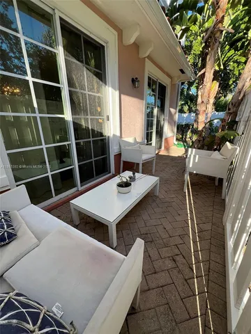 a view of an outdoor space with seating area