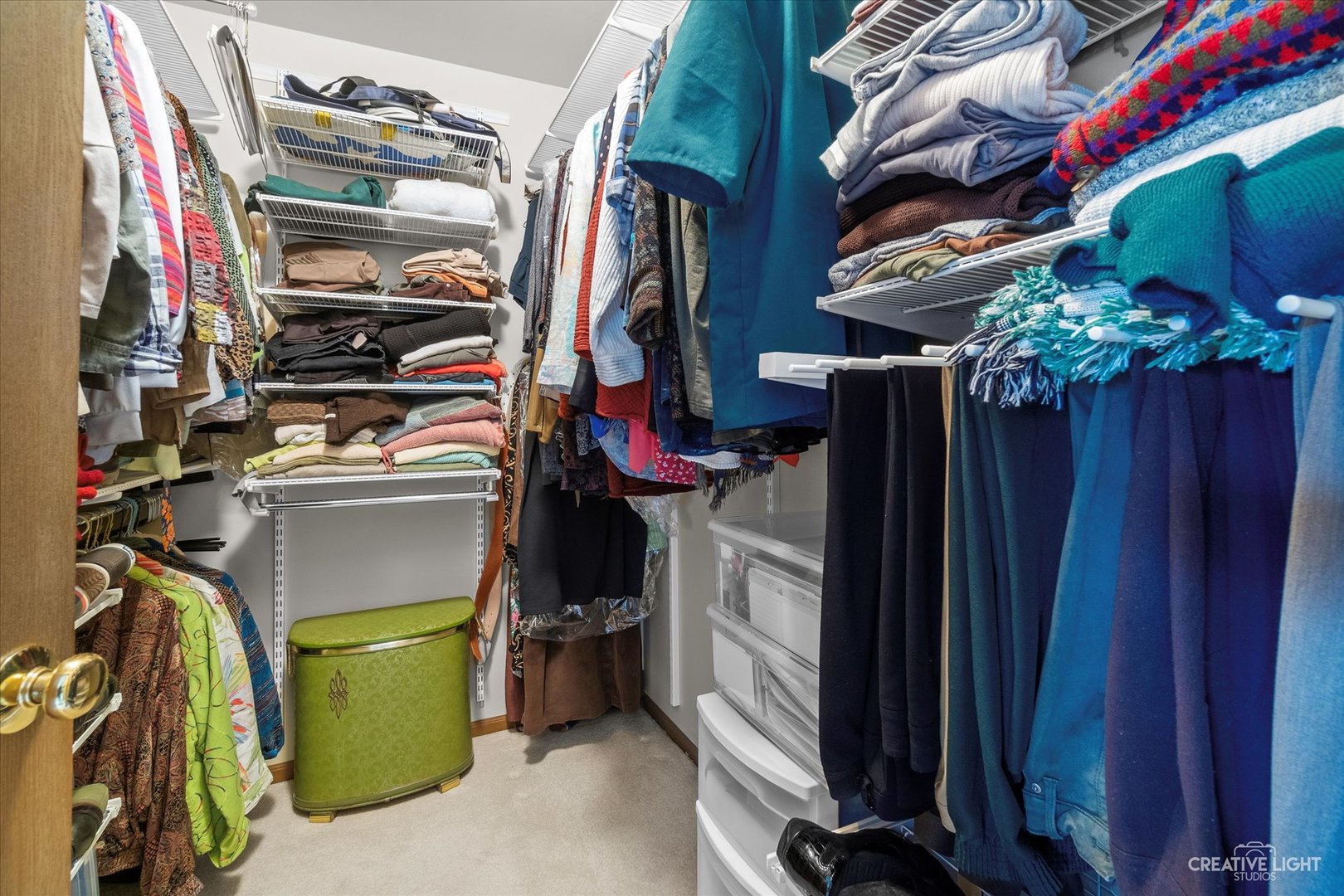 683 Bent Ridge Lane Elgin, IL 60120 - Photo 19 of 27 a view of walk in closet with clothes and shoes