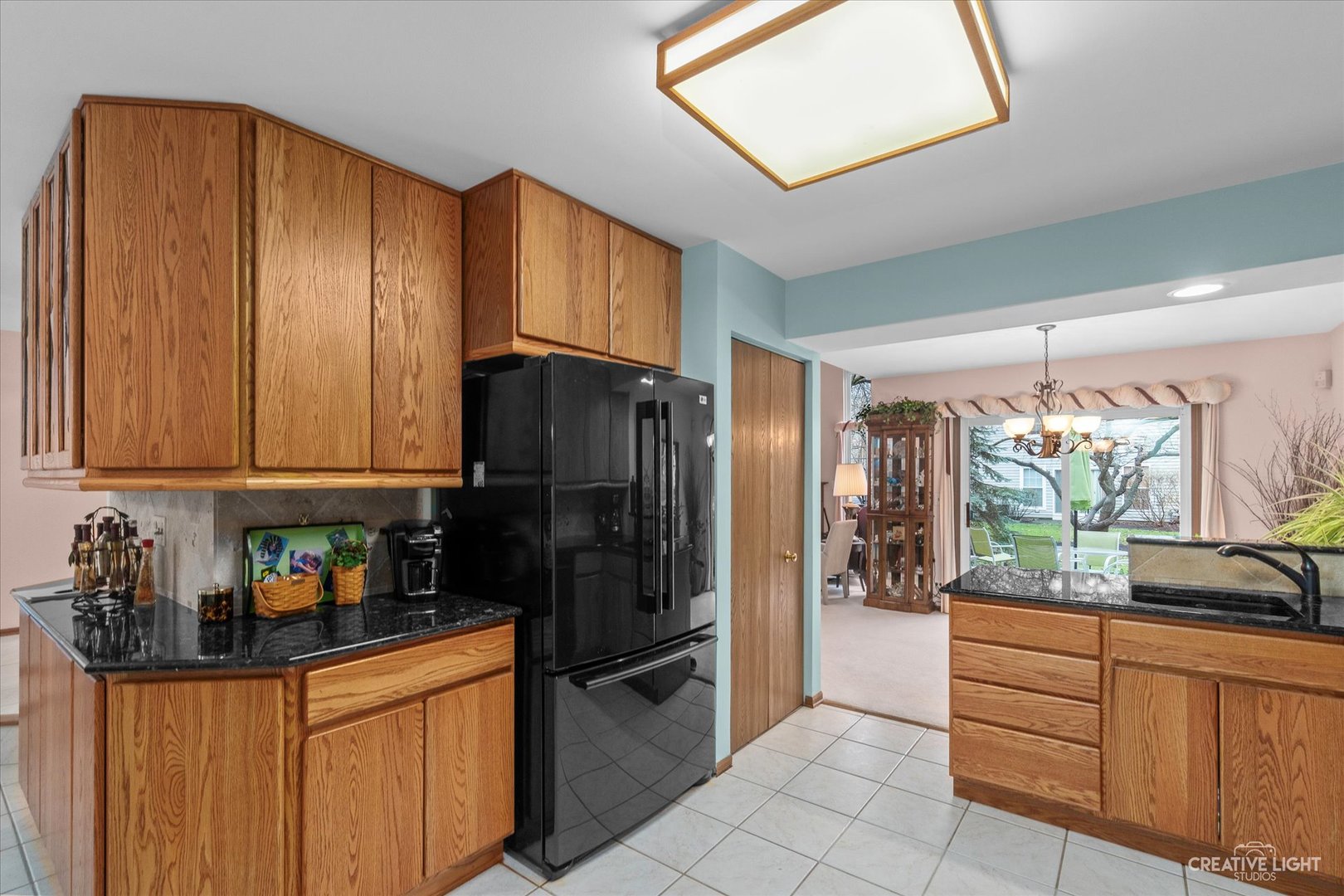683 Bent Ridge Lane Elgin, IL 60120 - Photo 8 of 27 a kitchen with stainless steel appliances granite countertop a refrigerator and a sink