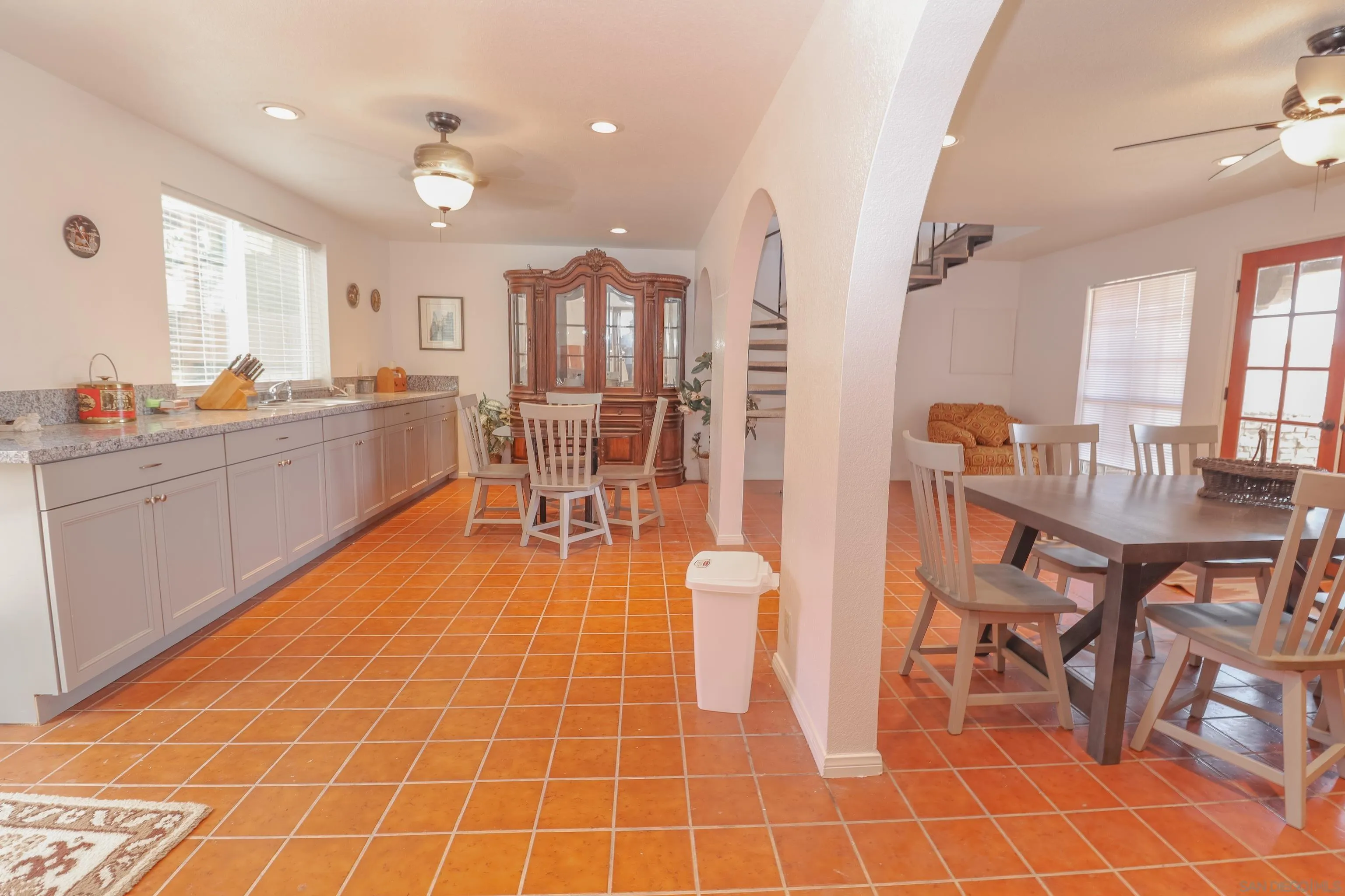 21141 Sharp Road Perris, CA 92570 - Photo 13 of 43 a large dining hall with stainless steel appliances a table and chairs