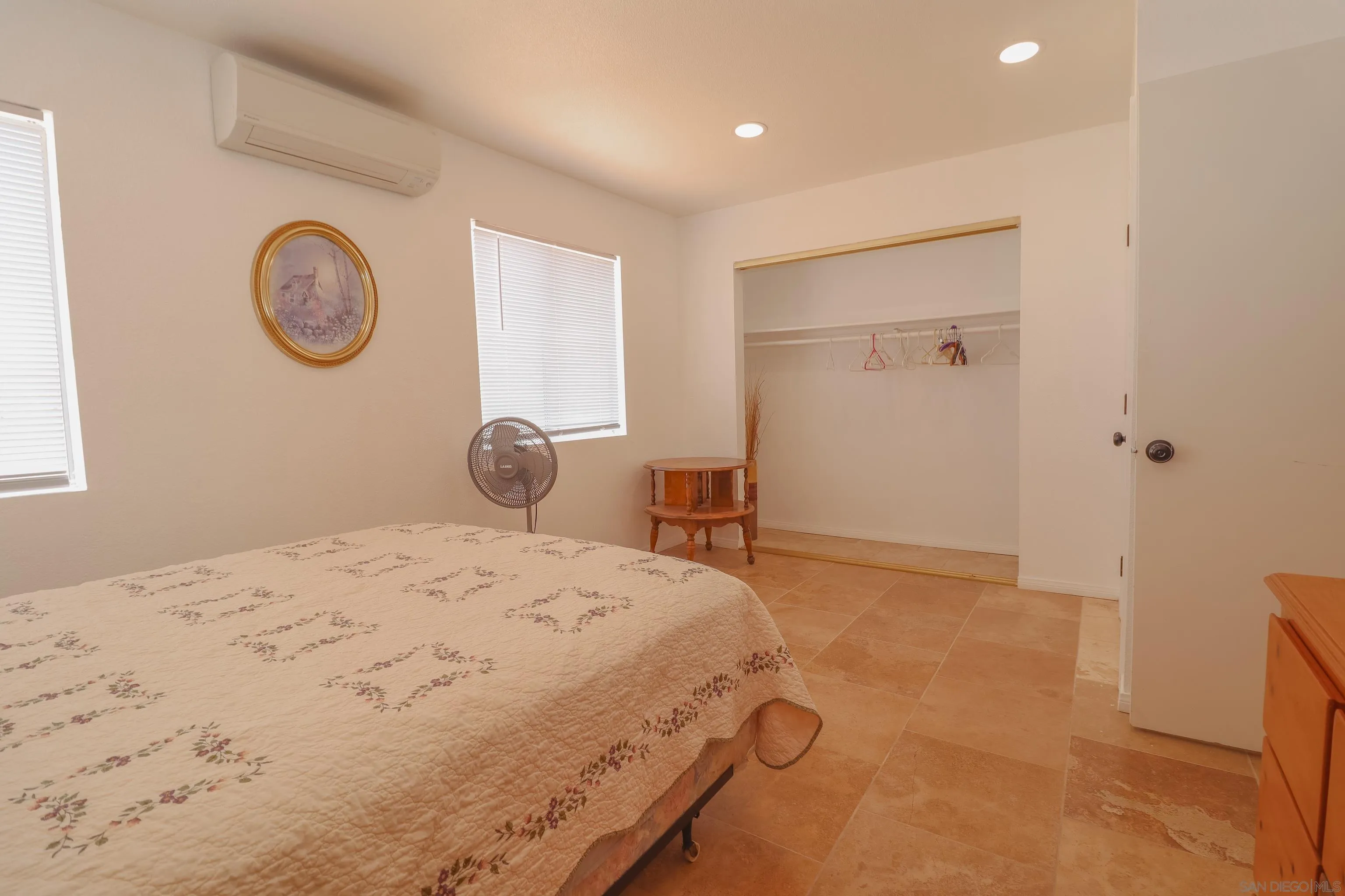 21141 Sharp Road Perris, CA 92570 - Photo 29 of 43 a bedroom with a bed and a closet