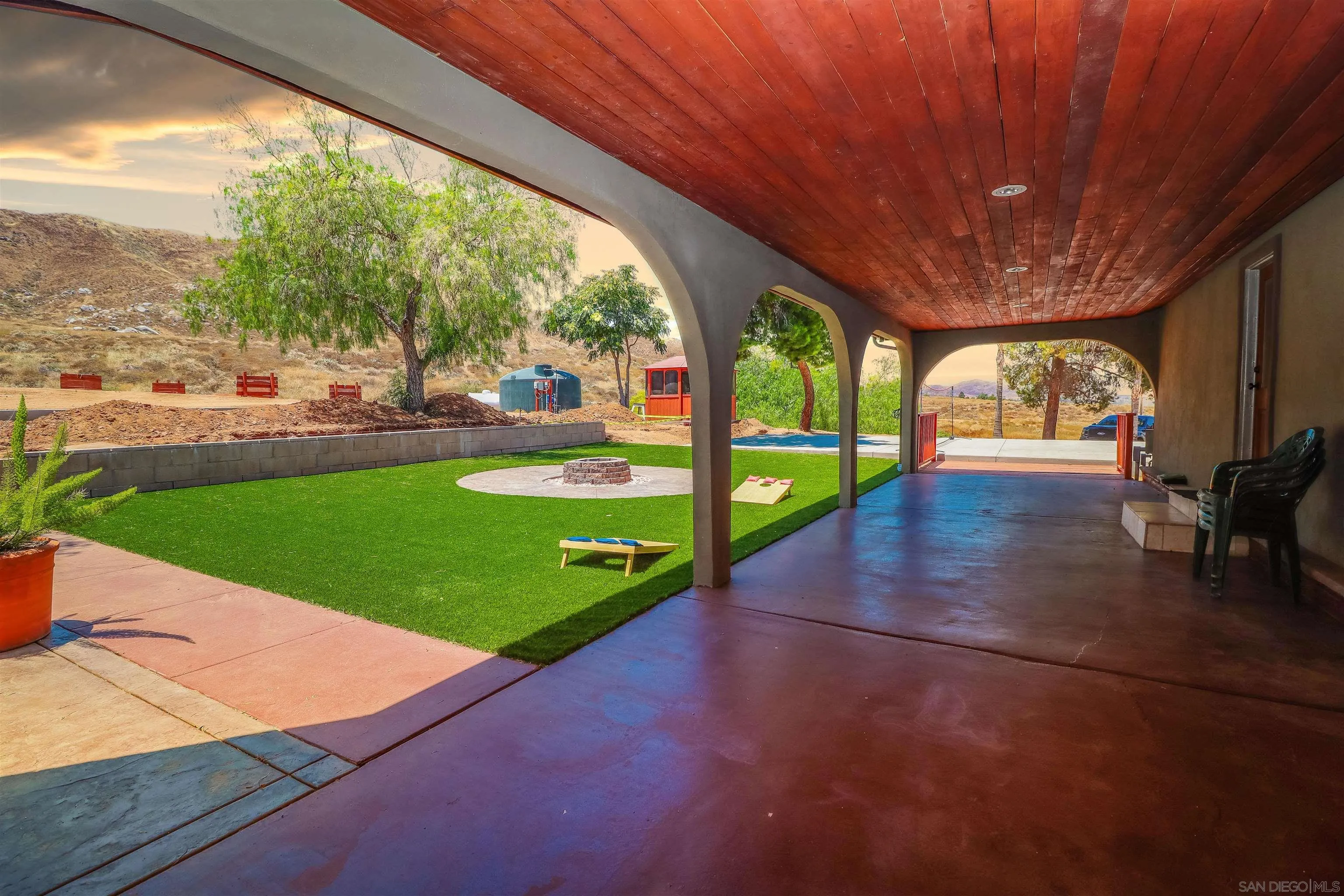 21141 Sharp Road Perris, CA 92570 - Photo 43 of 43 a view of a swimming pool with an outdoor seating