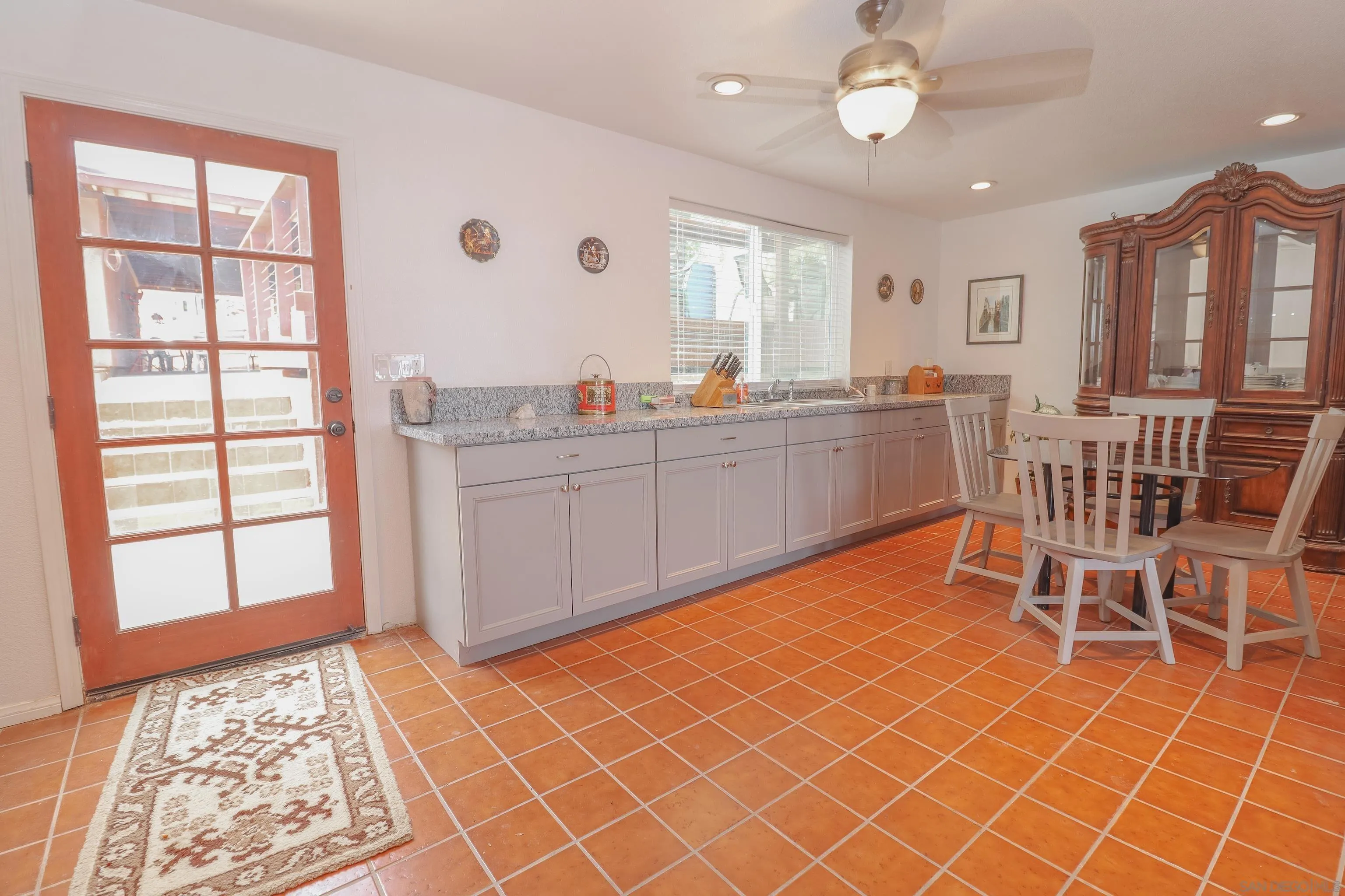 21141 Sharp Road Perris, CA 92570 - Photo 10 of 43 a room with furniture a rug and windows