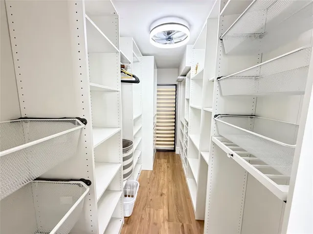 a view of a hallway with washer and dryer