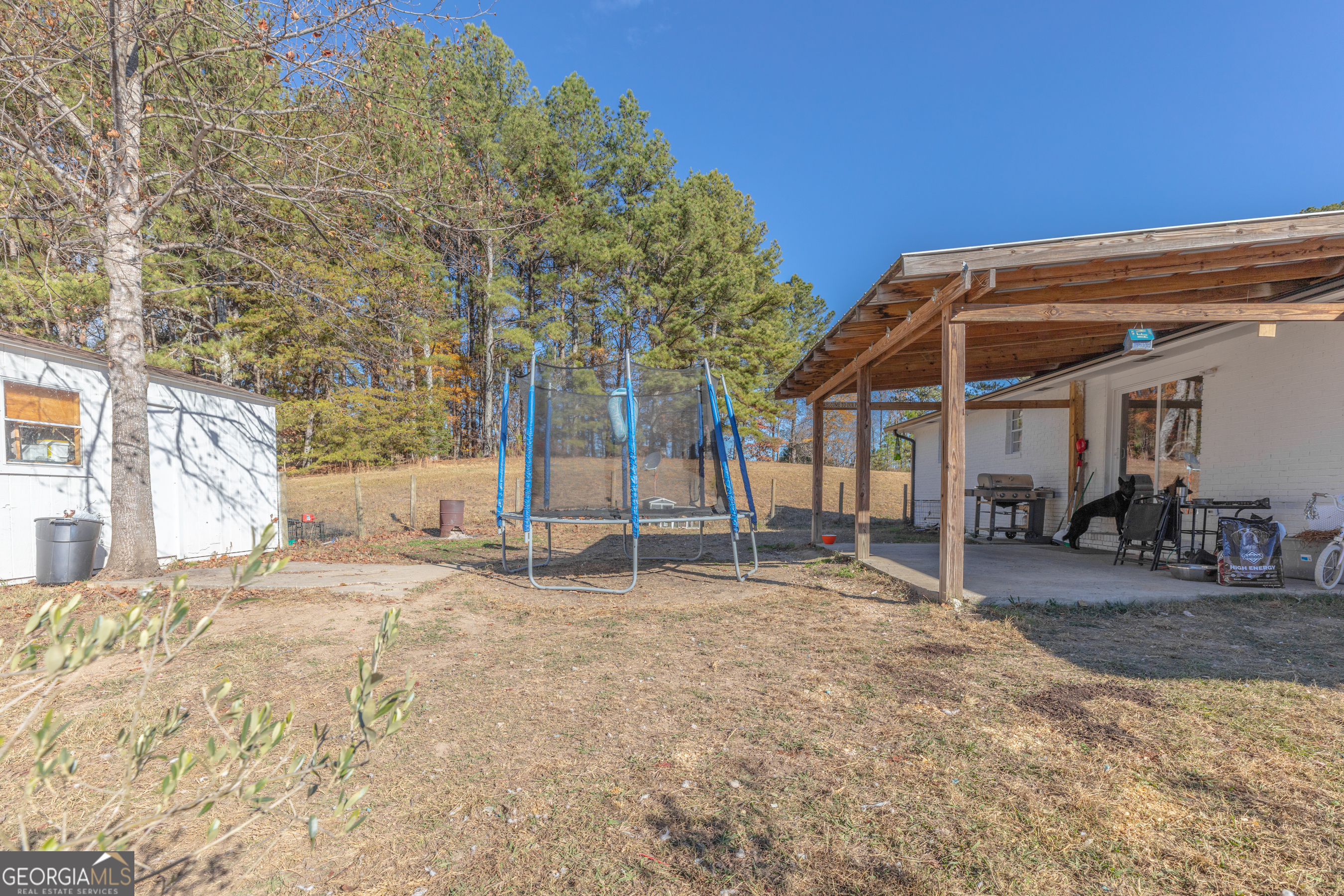1144 Ridgeway Road LaFayette, GA 30728 - Photo 32 of 66 a view of a house with backyard and sitting area