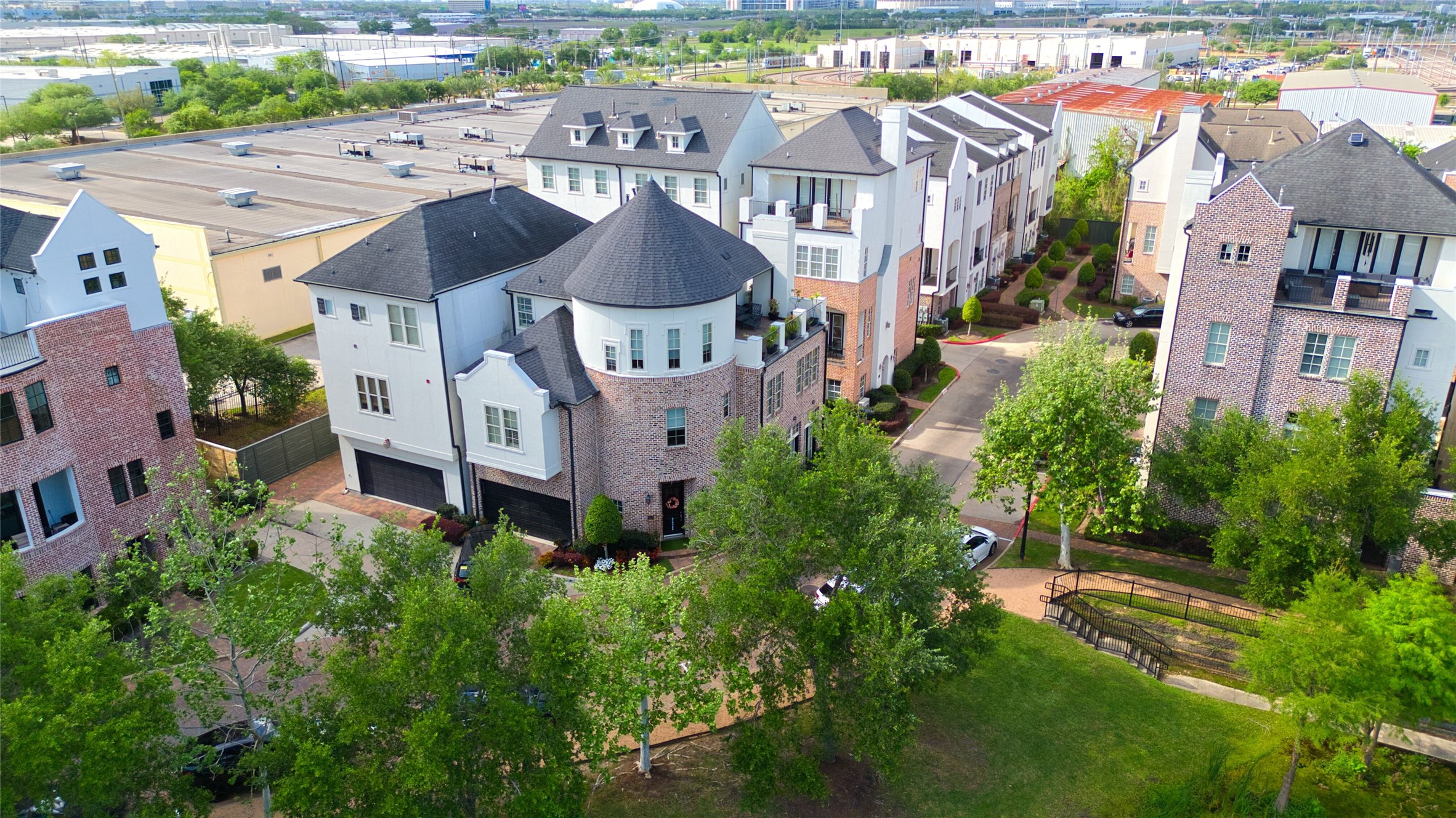 2029 Fannin Station North Houston, TX 77045 - Photo 11 of 14 an aerial view of multiple houses with a yard