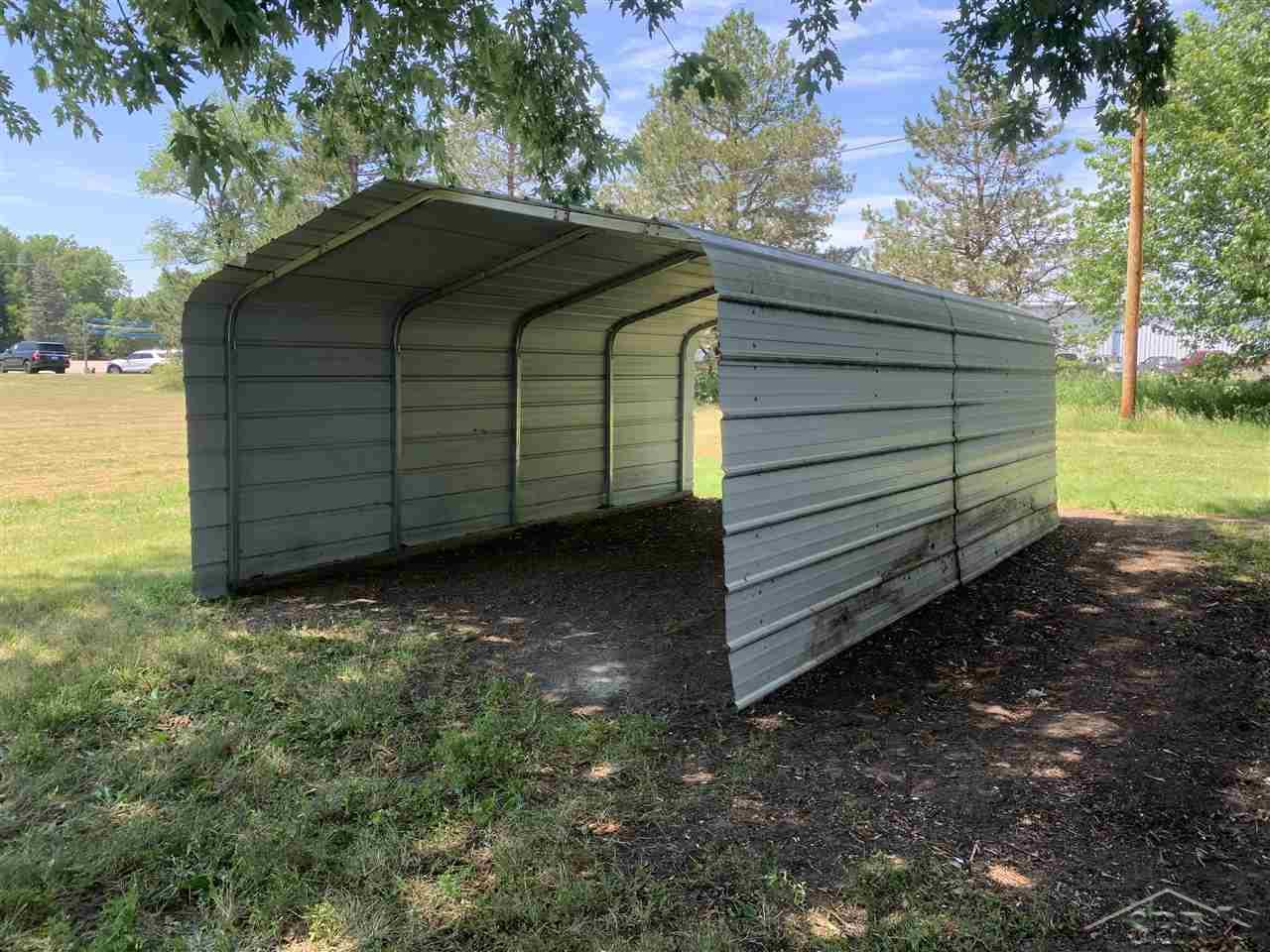 6708 Muirhead Road Freeland, MI 48623 - Photo 24 of 29 Car port for extra storage or parking.