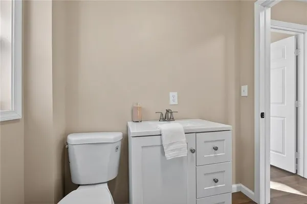 a view of bathroom with a toilet sink