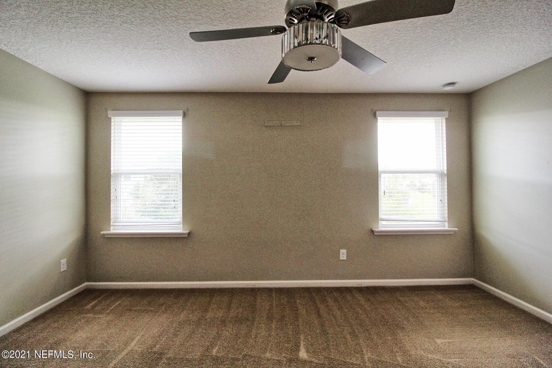 3207 Chestnut Ridge Way, Unit 18F Orange Park, FL 32065 - Photo 11 of 28 Primary bedroom
